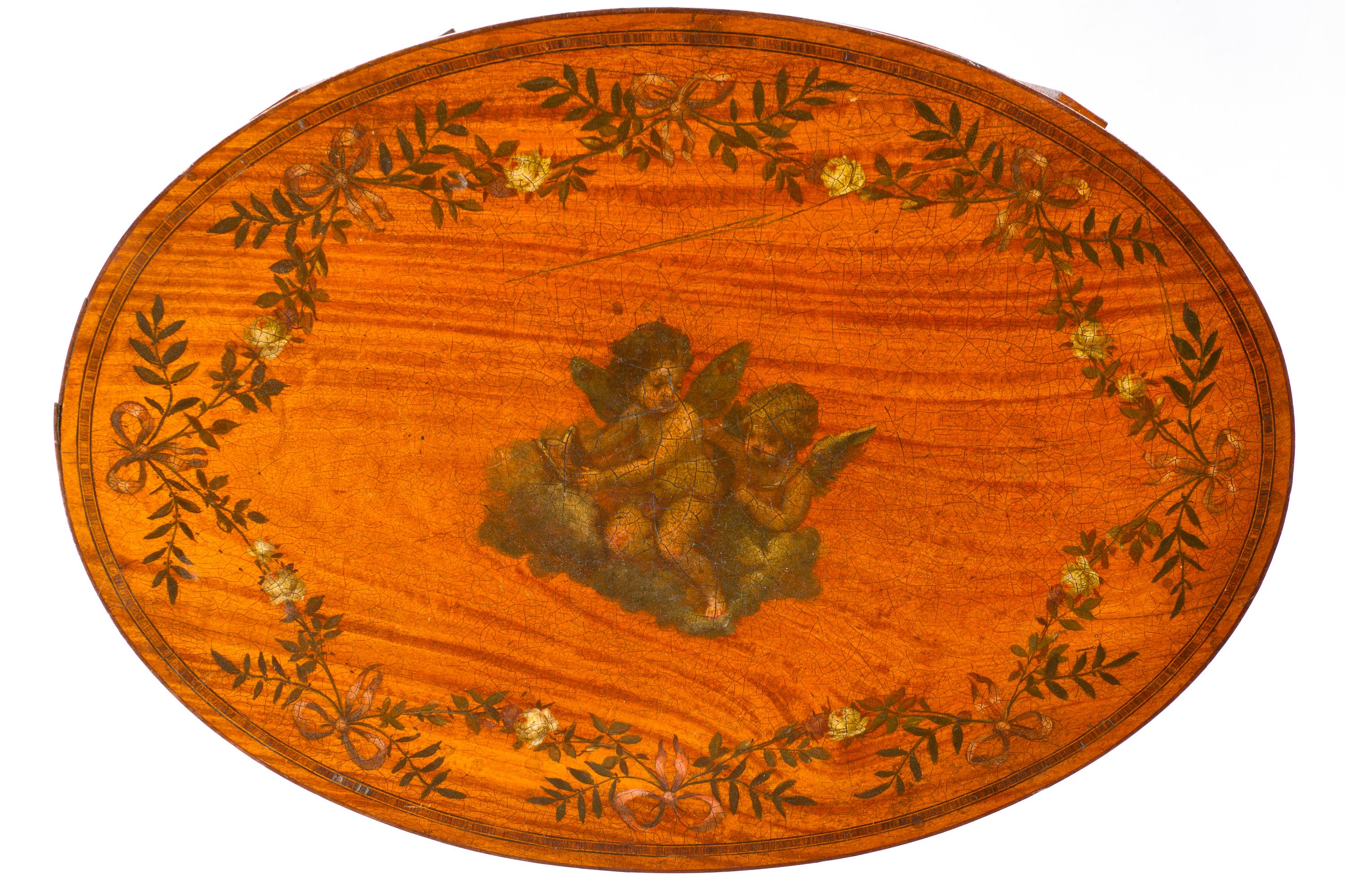 An Edwardian Style Painted Satinwood Work Table, Height 28 3/4 x width 21 3/4 x depth 15 3/4 inches.