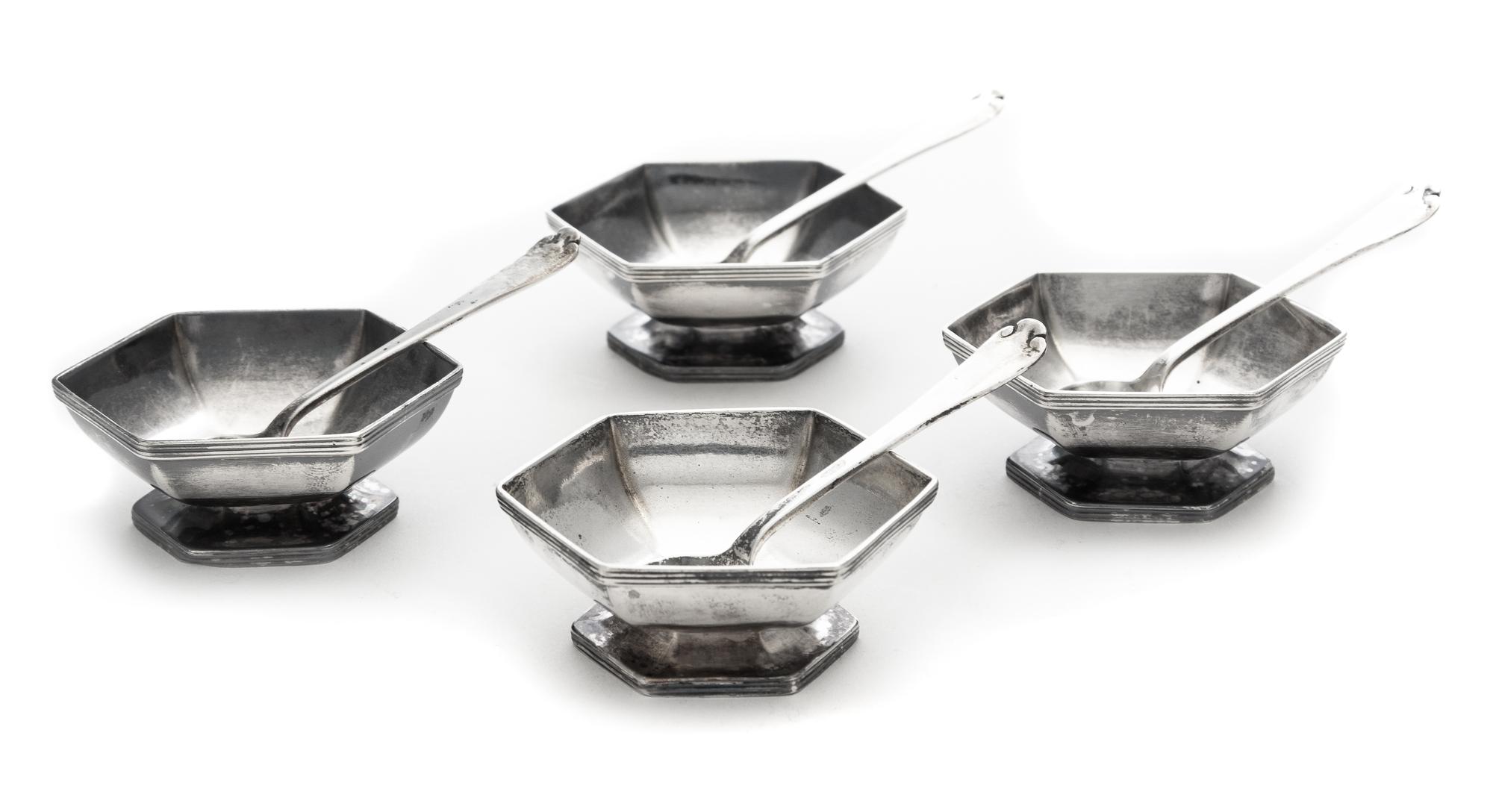 An American Silver Salt Service, Tiffany & Co., New York, NY, Late 19th/early 20th century, comprising four hexagonal salt cellars with