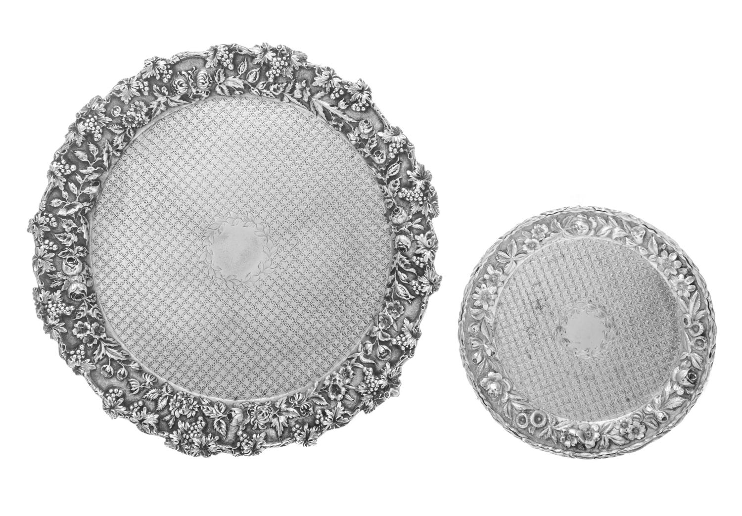 Two American Silver Salvers, S. Kirk & Son, Baltimore, MD, each of circular form, the rim worked to show grape clusters and vines enclo