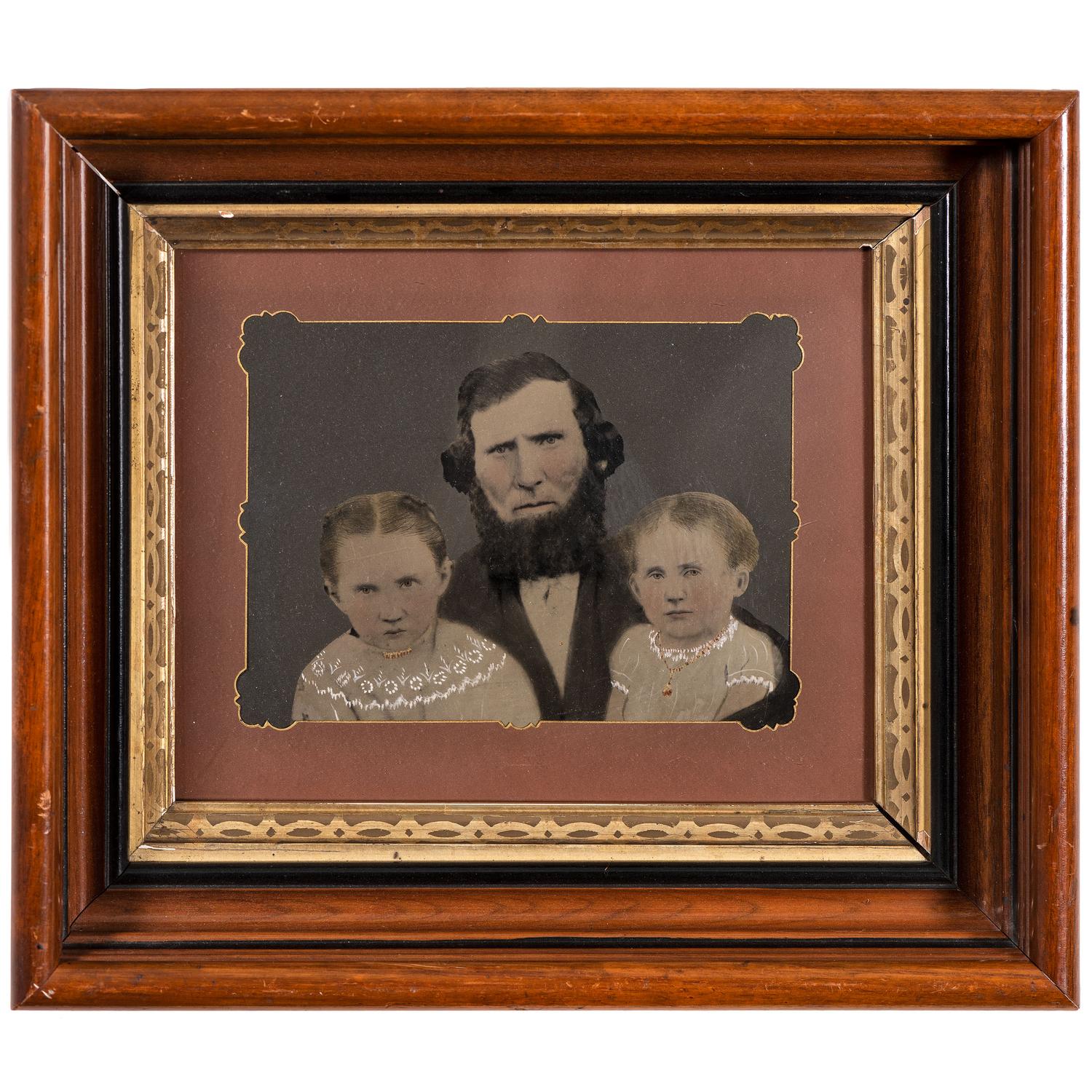 [EARLY PHOTOGRAPHY - PORTRAITURE]. A group of 7 folk art hand-painted tintypes featuring children, including: