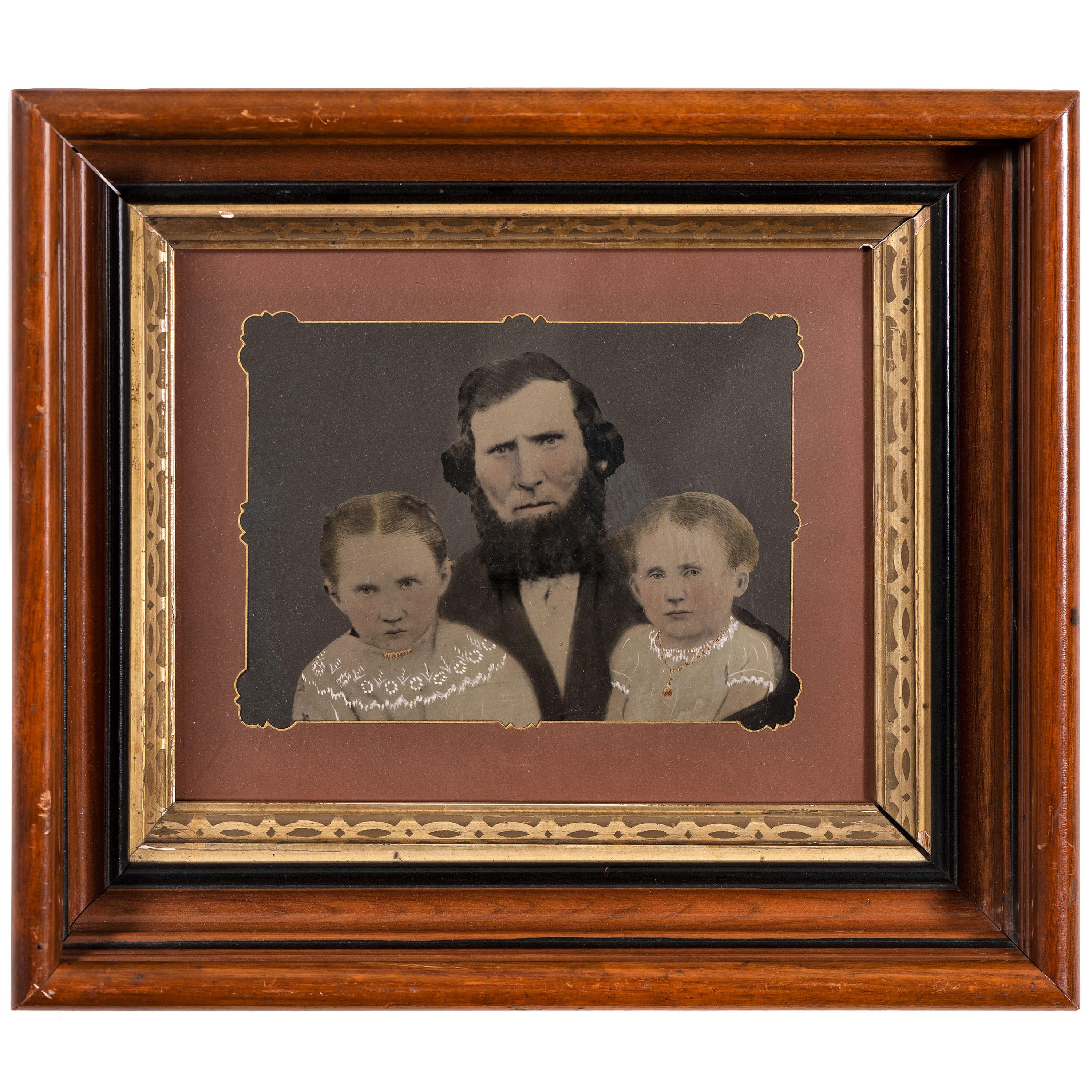 [EARLY PHOTOGRAPHY - PORTRAITURE]. A group of 7 folk art hand-painted tintypes featuring children, including: