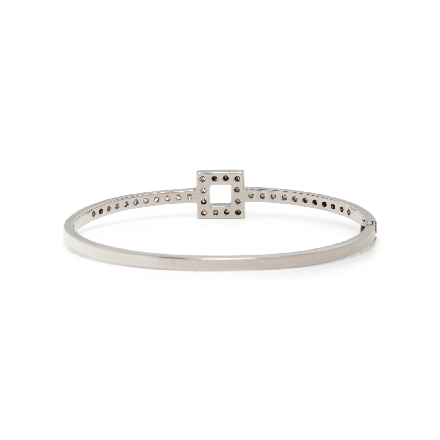 TIFFANY & CO., PLATINUM AND DIAMOND BANGLE BRACELET