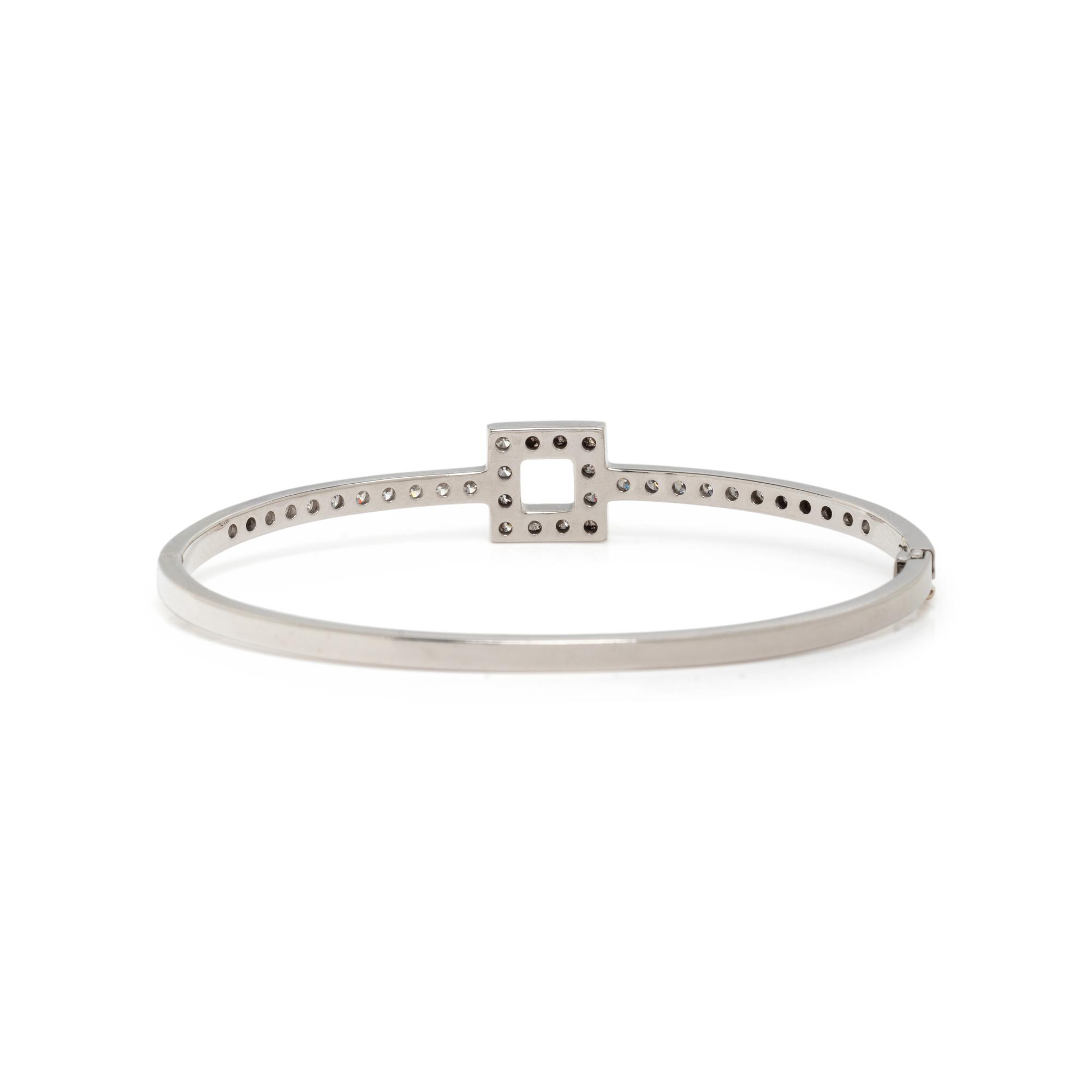 TIFFANY & CO., PLATINUM AND DIAMOND BANGLE BRACELET