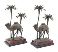 A Pair of Orientalist Cast Metal Two Light Candelabra Height overall 15 1/2 inches. — 20TH CENTURY