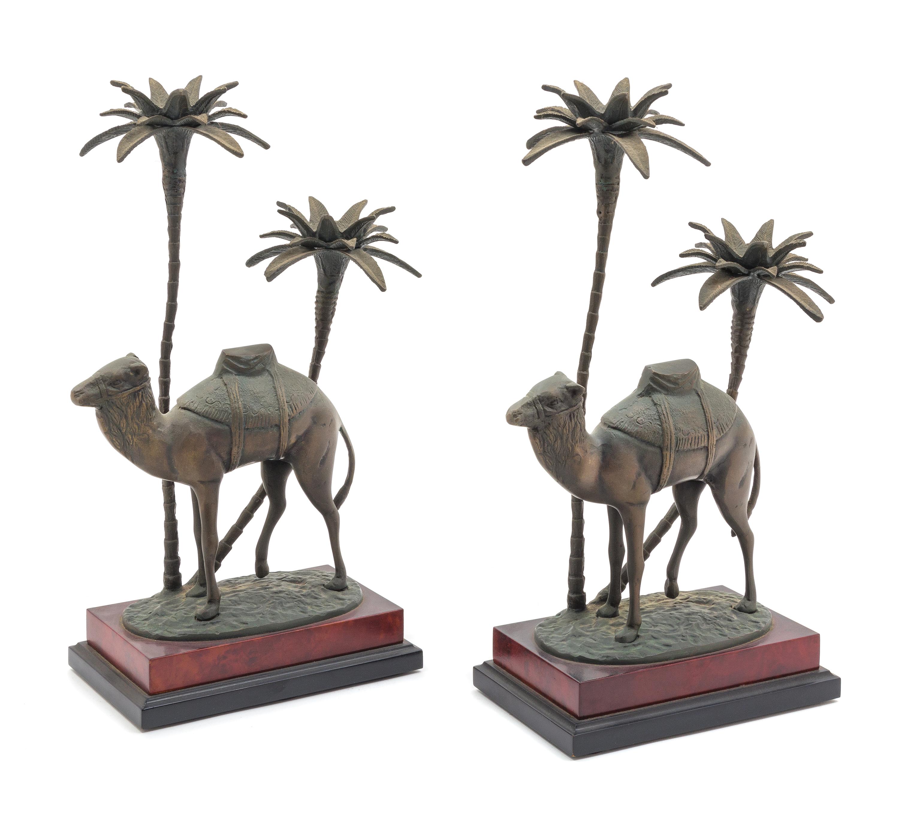 A Pair of Orientalist Cast Metal Two Light Candelabra Height overall 15 1/2 inches. — 20TH CENTURY