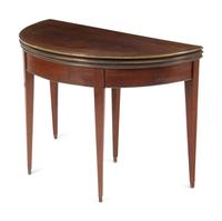 A Directoire Style Brass-Mounted Mahogany Flip-Top Table