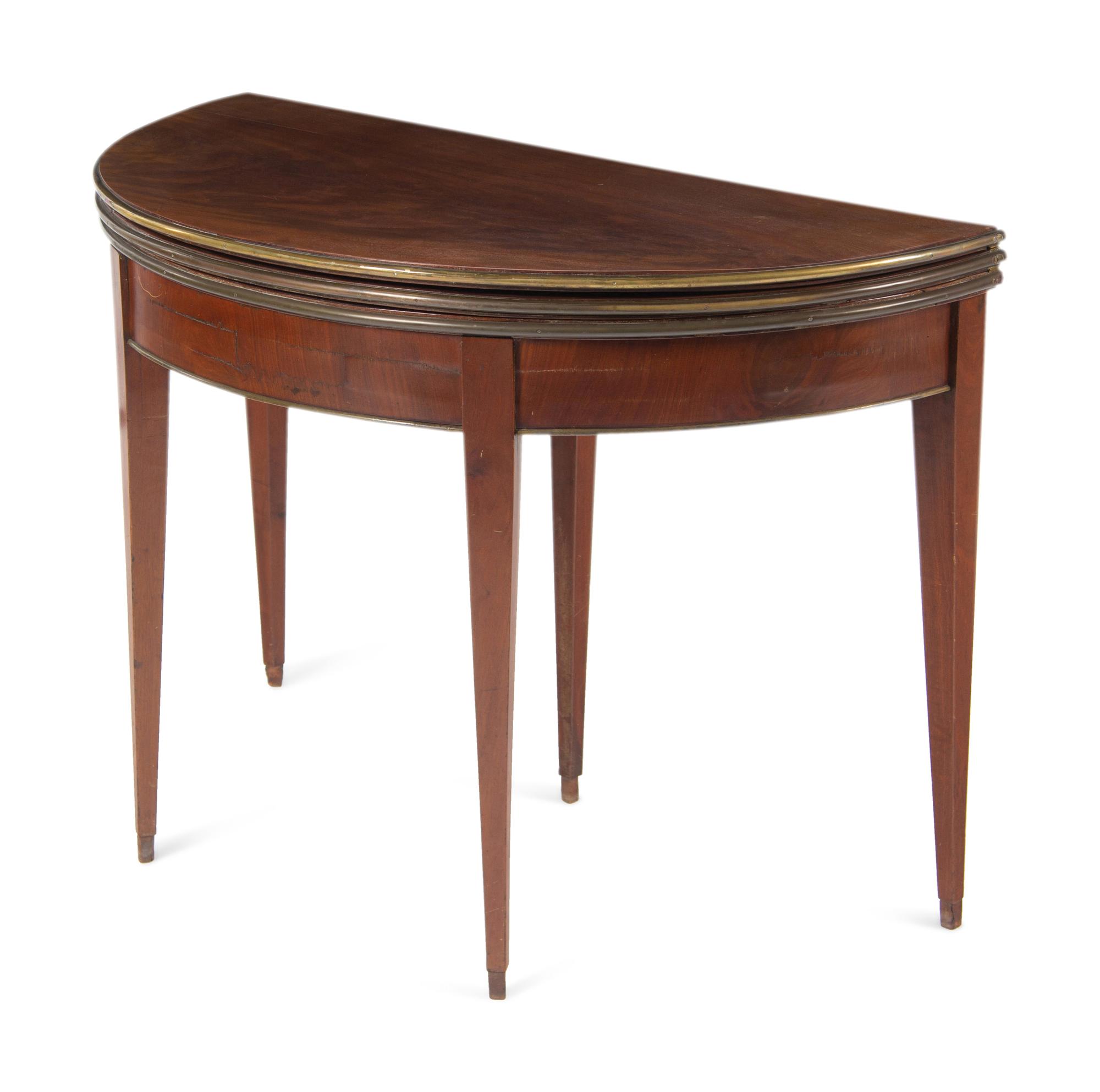 A Directoire Style Brass-Mounted Mahogany Flip-Top Table