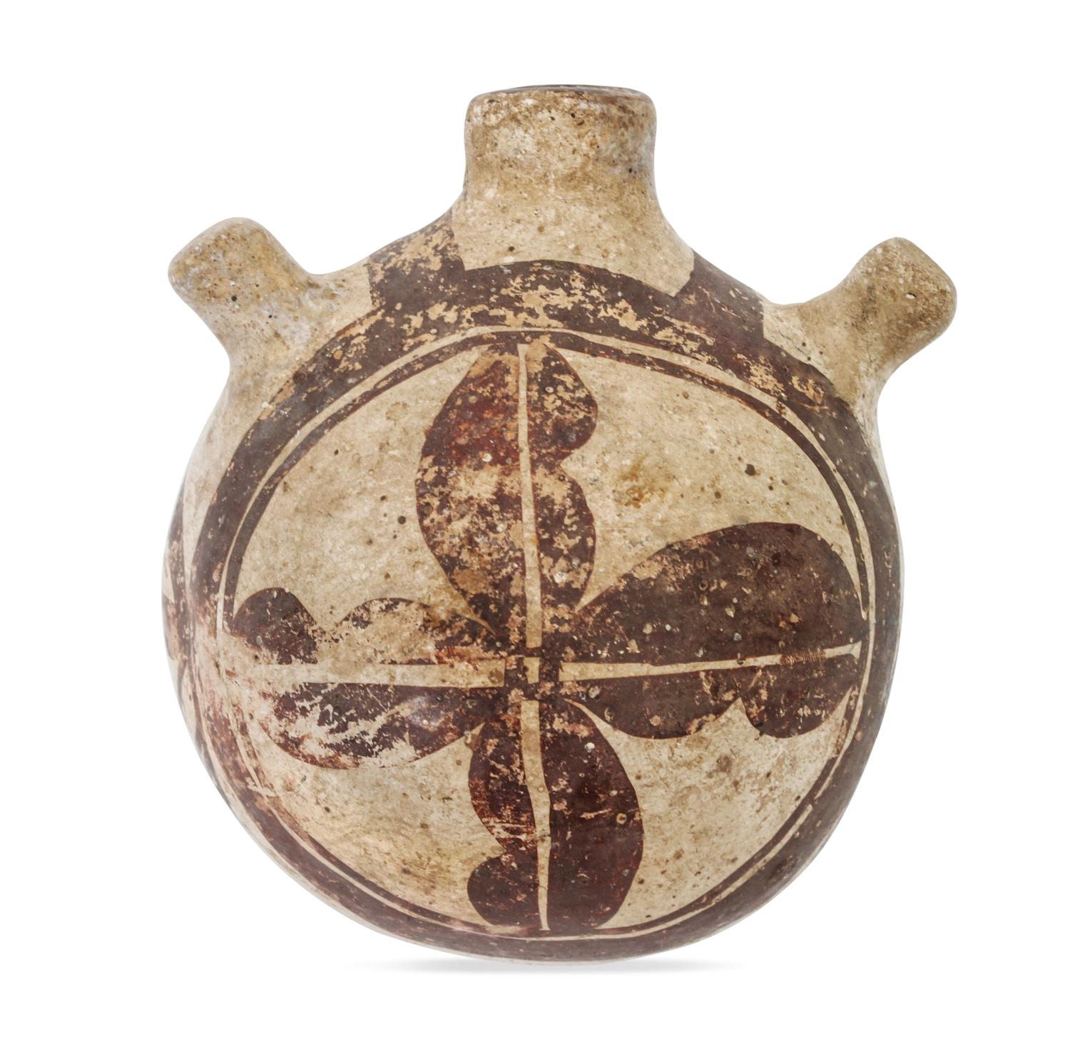 An Acoma Canteen Height 3 1/2 x diameter 3 1/2 inches.