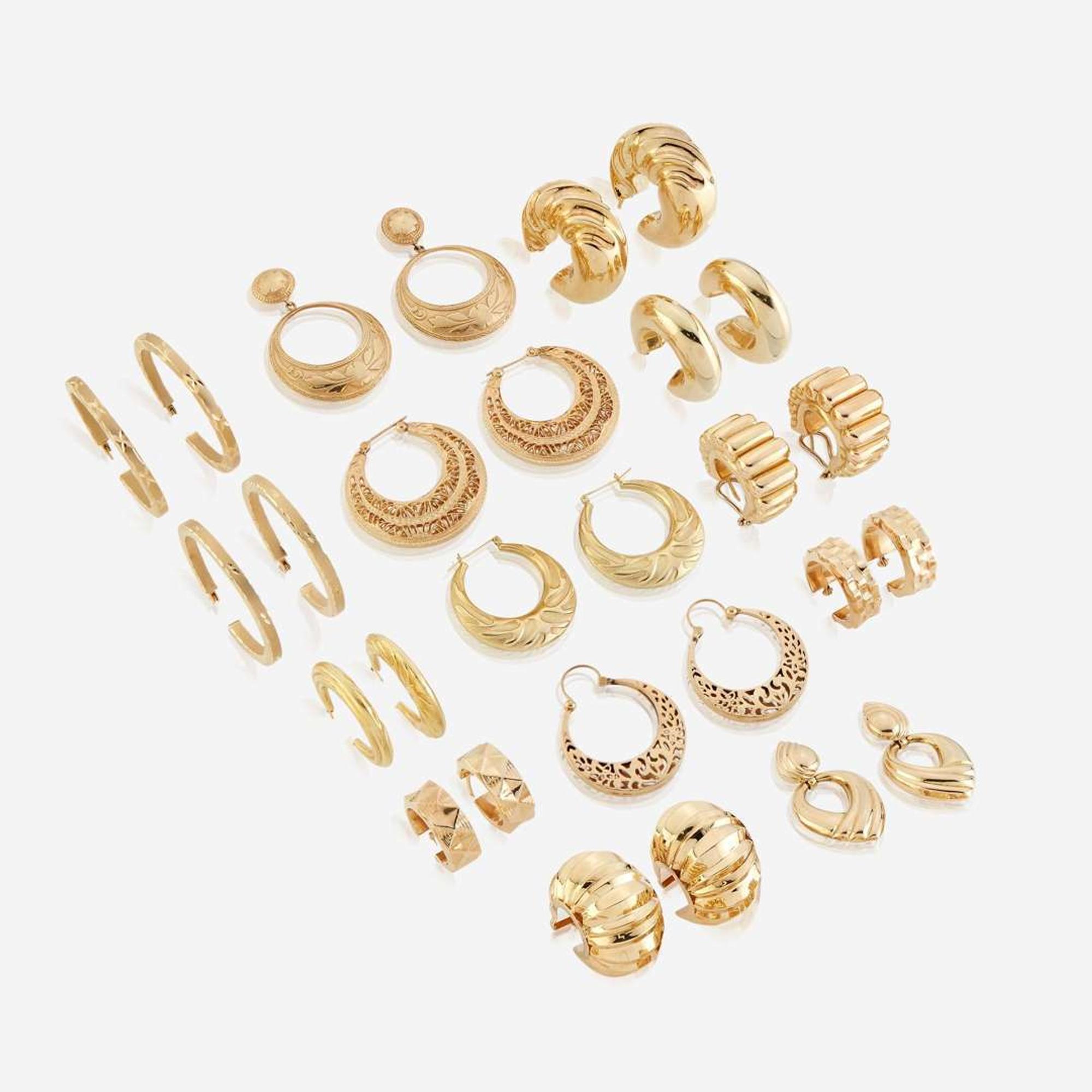 A collection of fourteen pairs of fourteen karat gold earrings