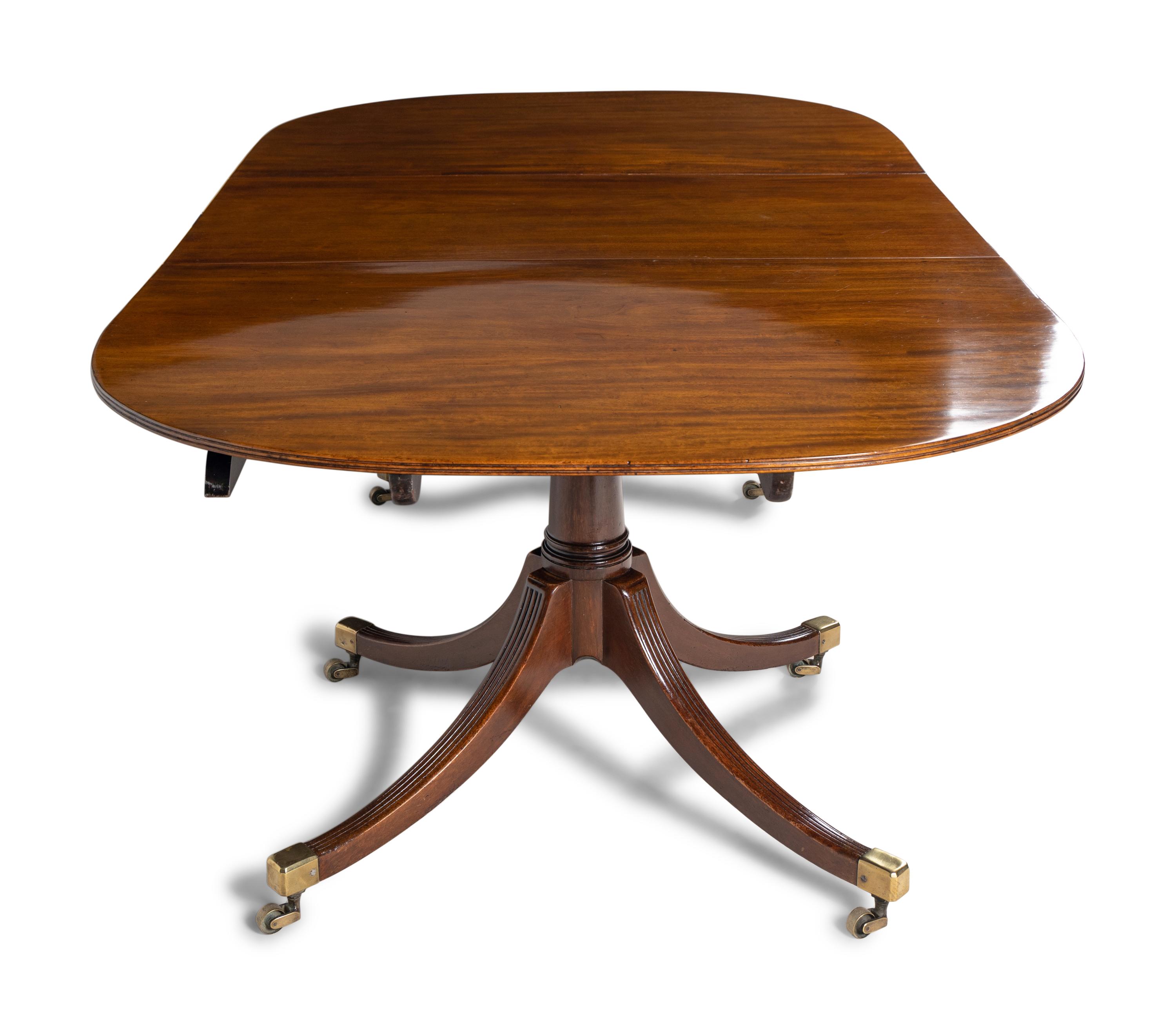 A George III Mahogany Double Pedestal Dining Table