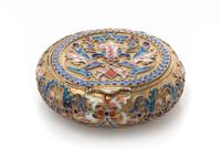 A Russian Silver and Enamel Snuff Box, Mark of Ivan Saltykov, Moscow, late 19th century, of circular form, having a gilt wash ground wi