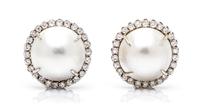 A Pair of White Gold, Cultured Mabe Pearl and Diamond Earclips, 9.70 dwts.