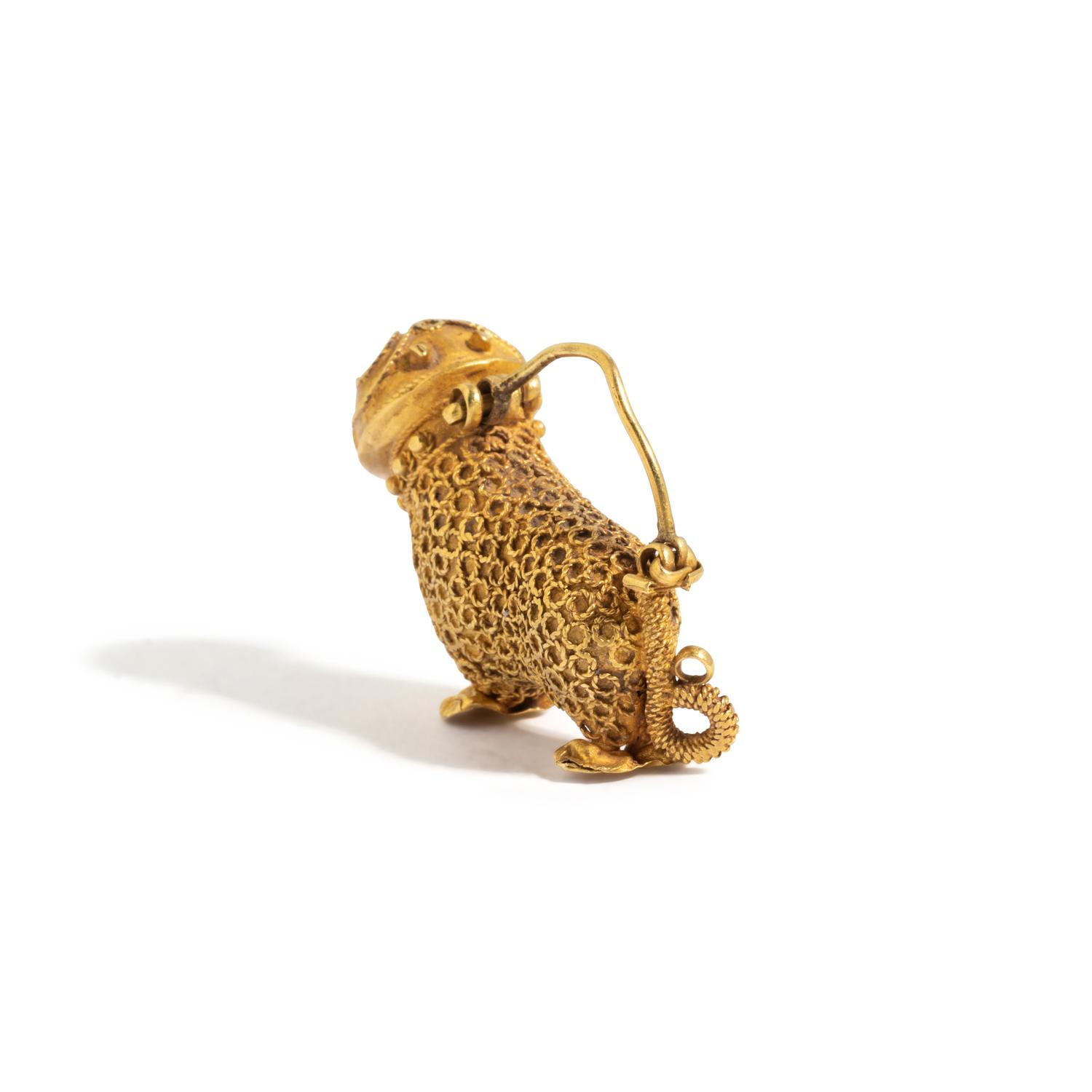 A Persian Gold Feline Earring
