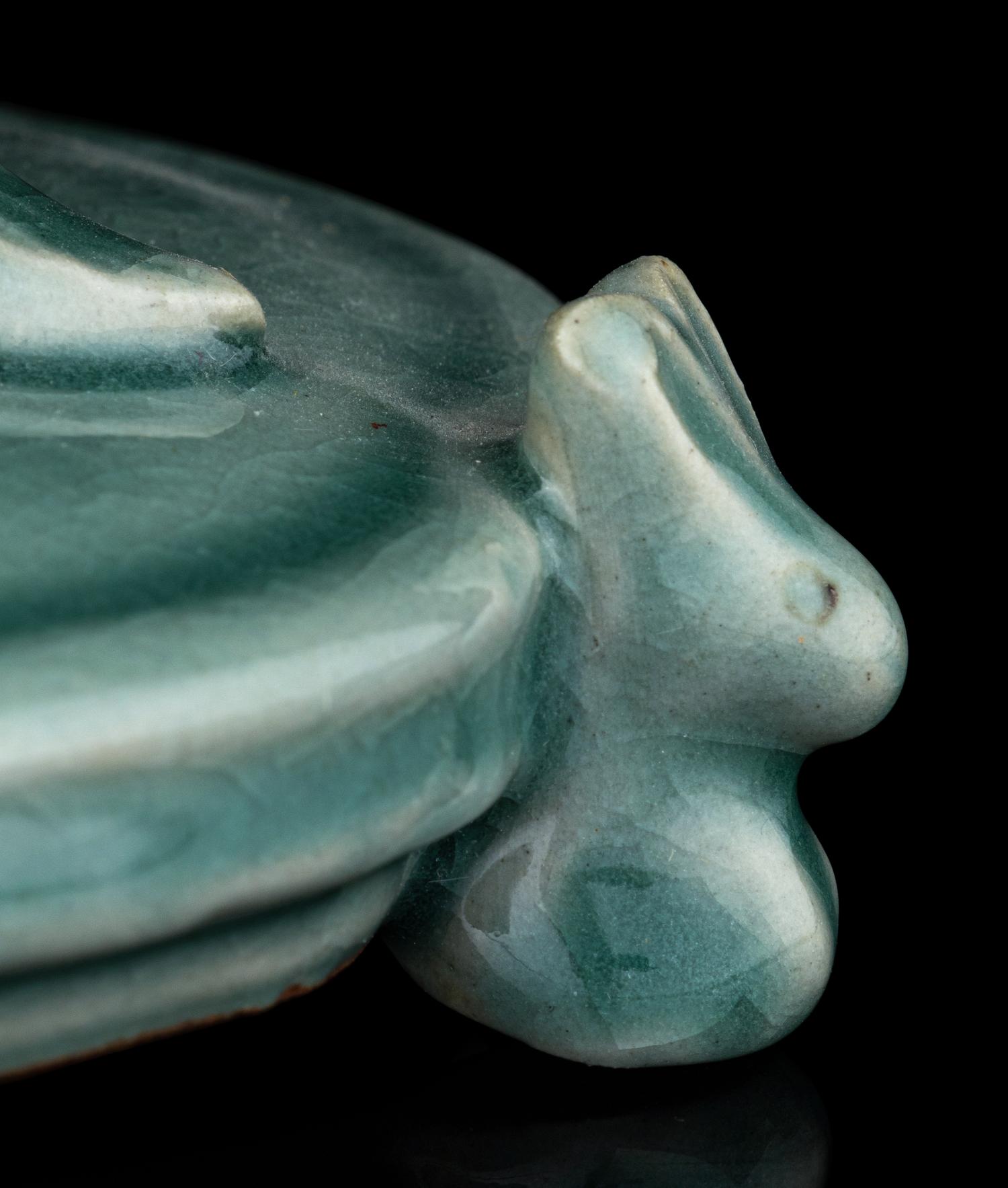 A Korean Celadon Glazed Porcelain 'Lotus' Incense Burner