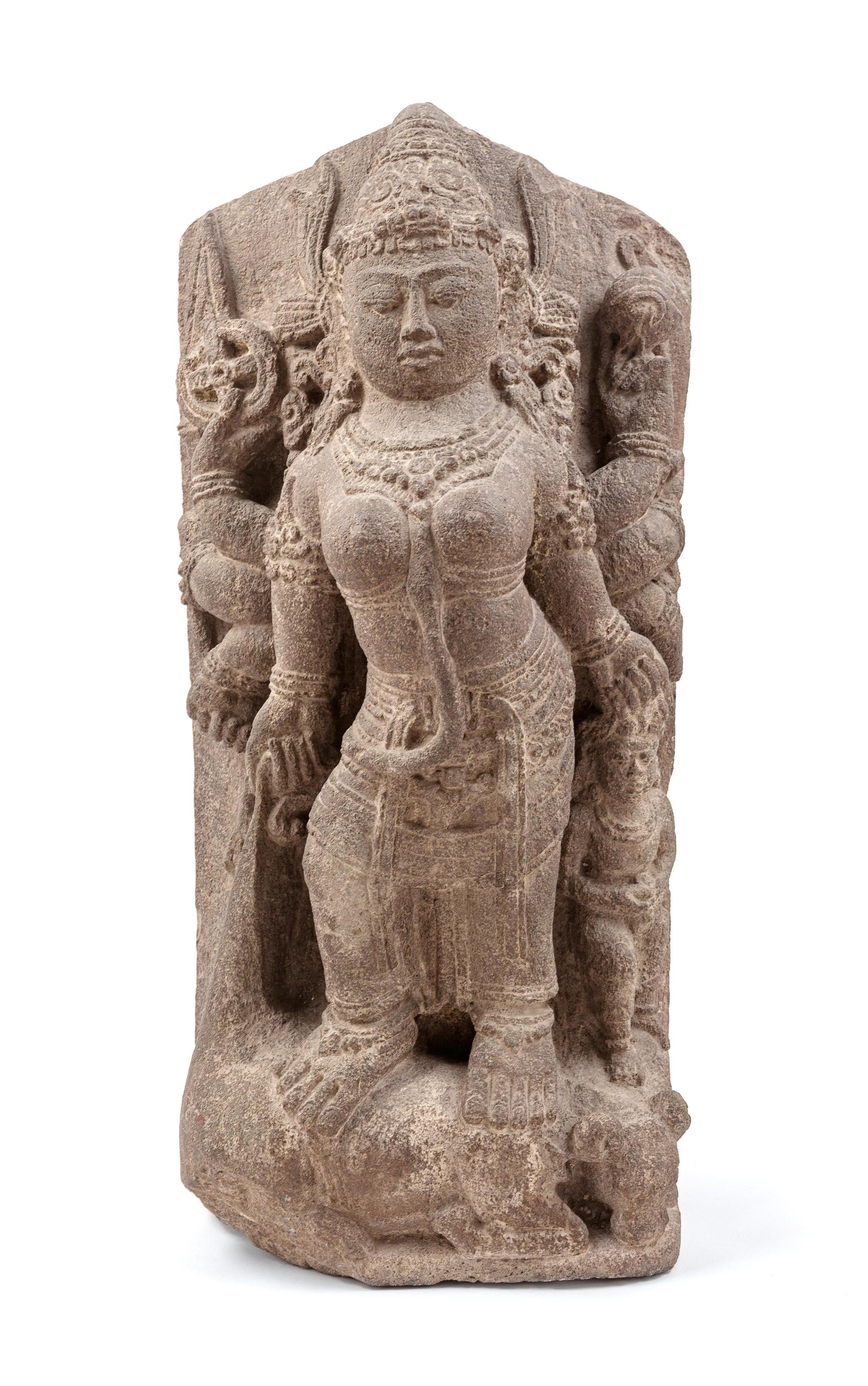 A Central Javanese Style Stone Stele of Durga Slaying the Buffalo Demon