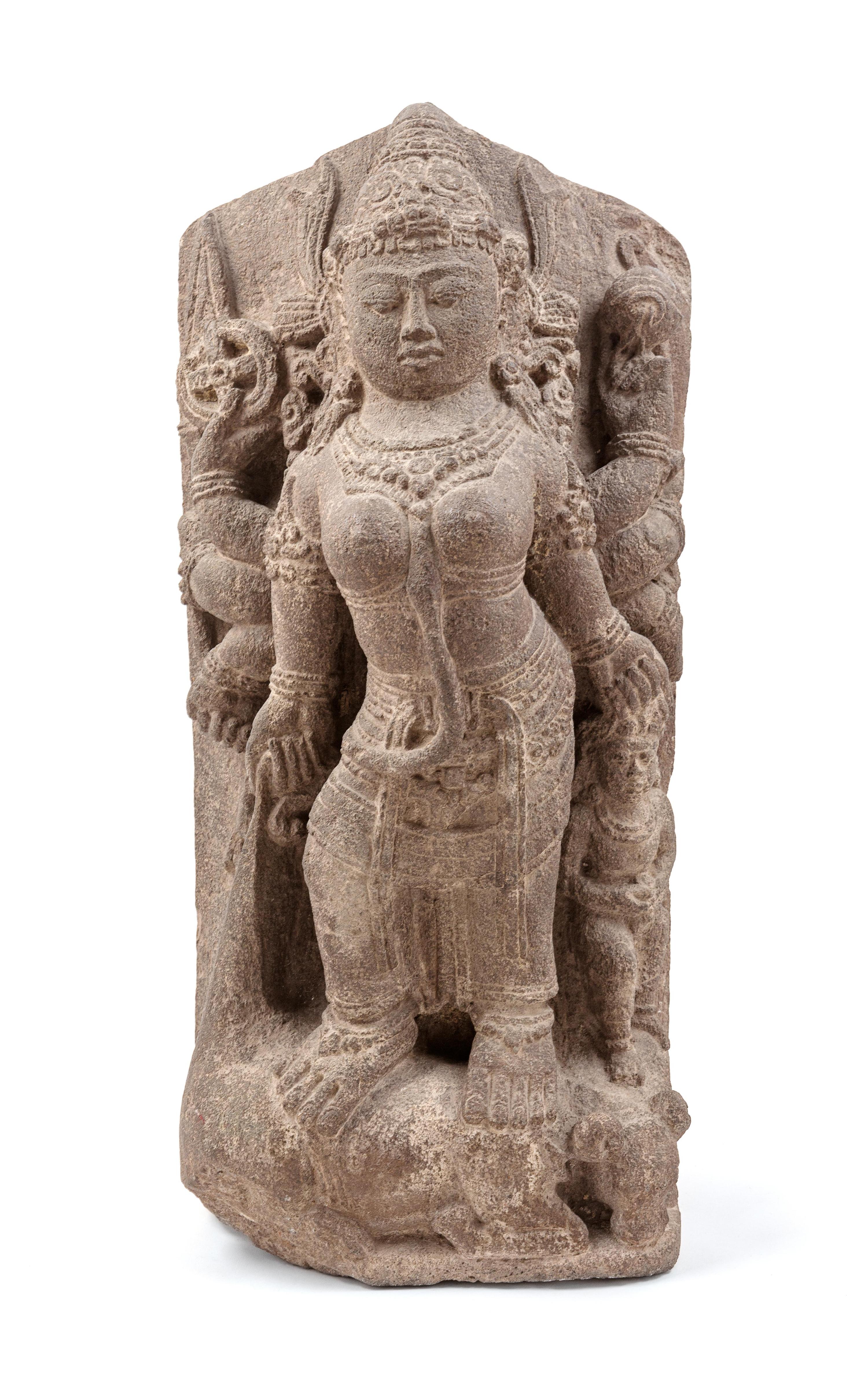 A Central Javanese Style Stone Stele of Durga Slaying the Buffalo Demon
