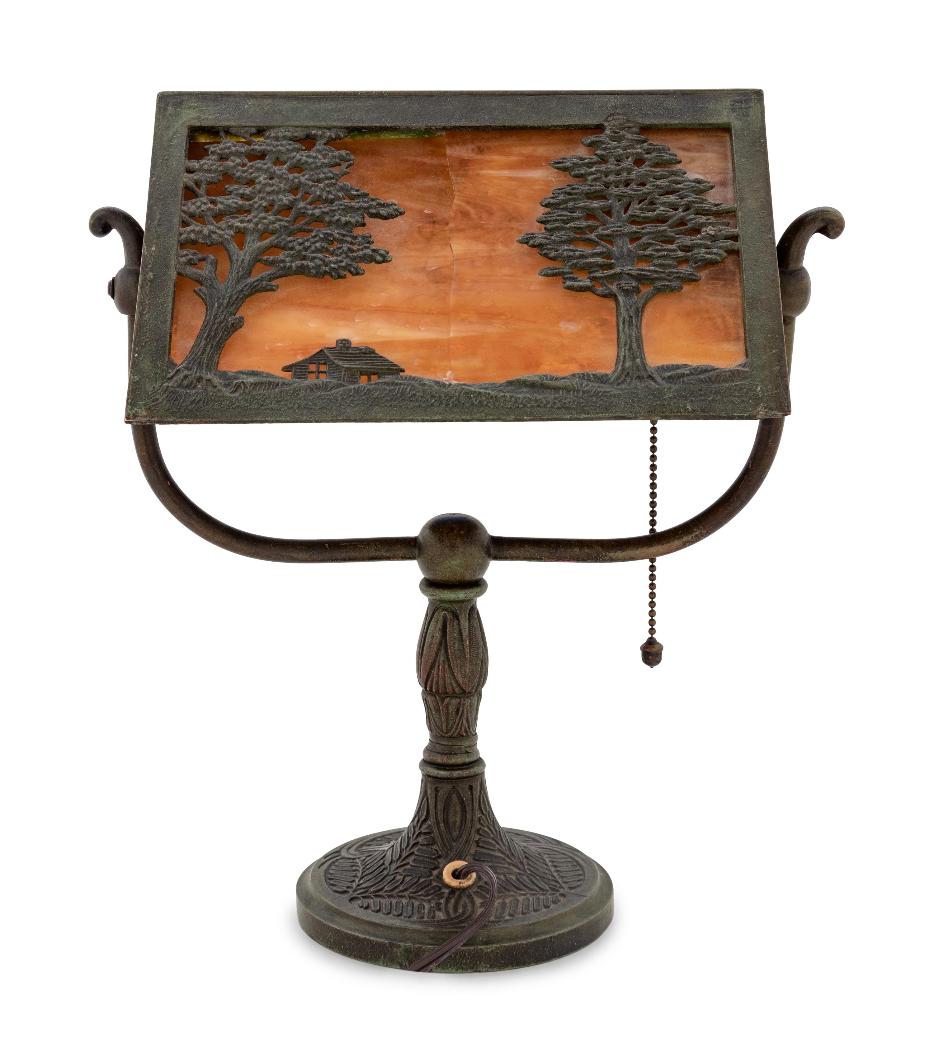 A Bradley & Hubbard Bronze and Slag Glass Lamp