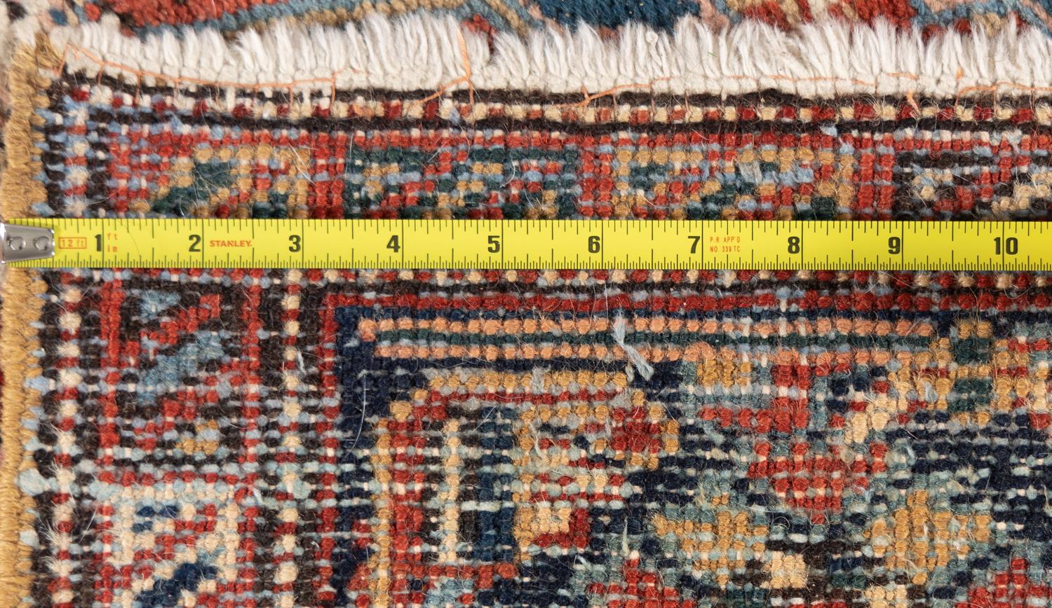 A Heriz Wool Rug
