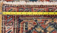 A Heriz Wool Rug