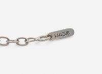 A Platinum and Diamond Tiffany & Co. Petals Key Pendant on a Sterling Silver Lalique Cord