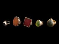 A Group of Five Islamic Stone and Metal Finger Rings