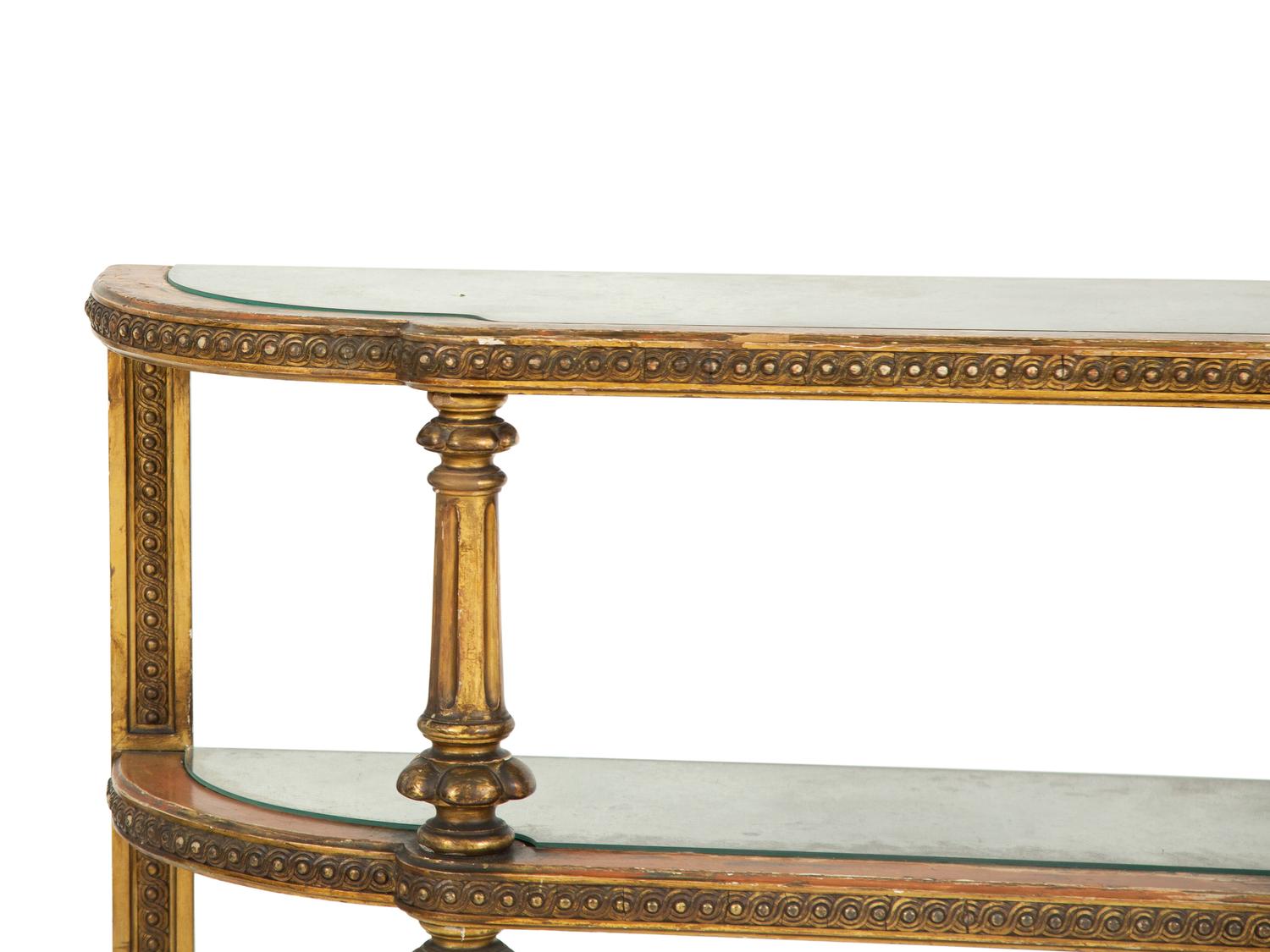 An Italian Carved and Painted Three Tier Etagere Console