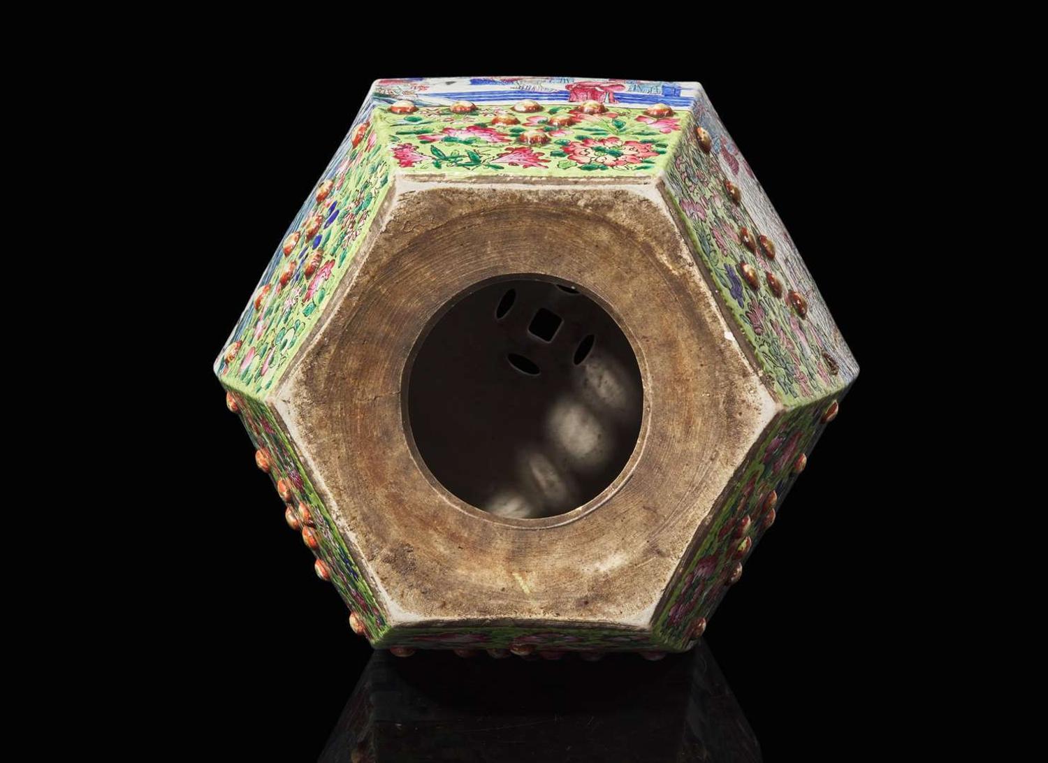A Chinese famille rose-decorated hexagonal garden stool, late 19th to early 20th century 粉彩開光繡墩 十九世紀晚至二十世紀初