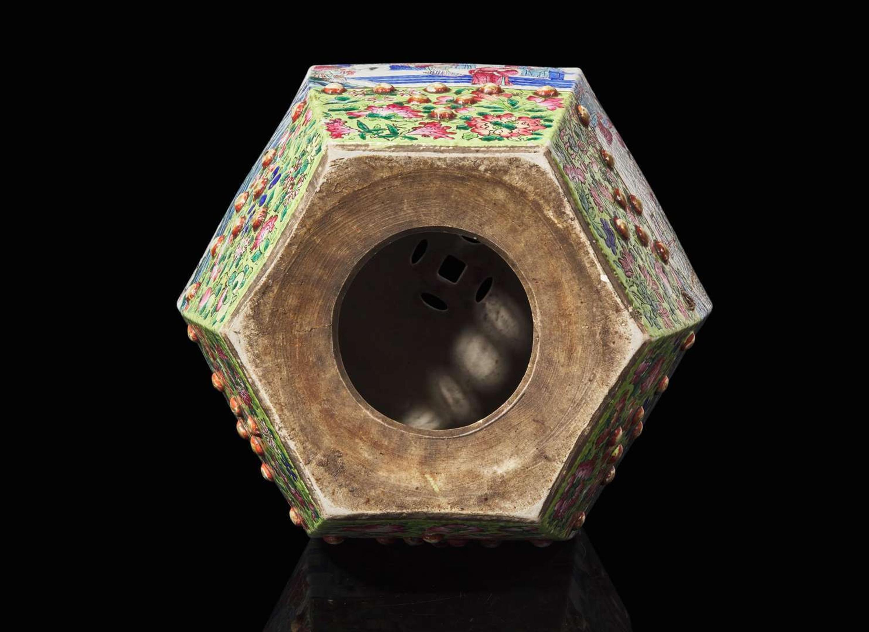 A Chinese famille rose-decorated hexagonal garden stool, late 19th to early 20th century 粉彩開光繡墩 十九世紀晚至二十世紀初