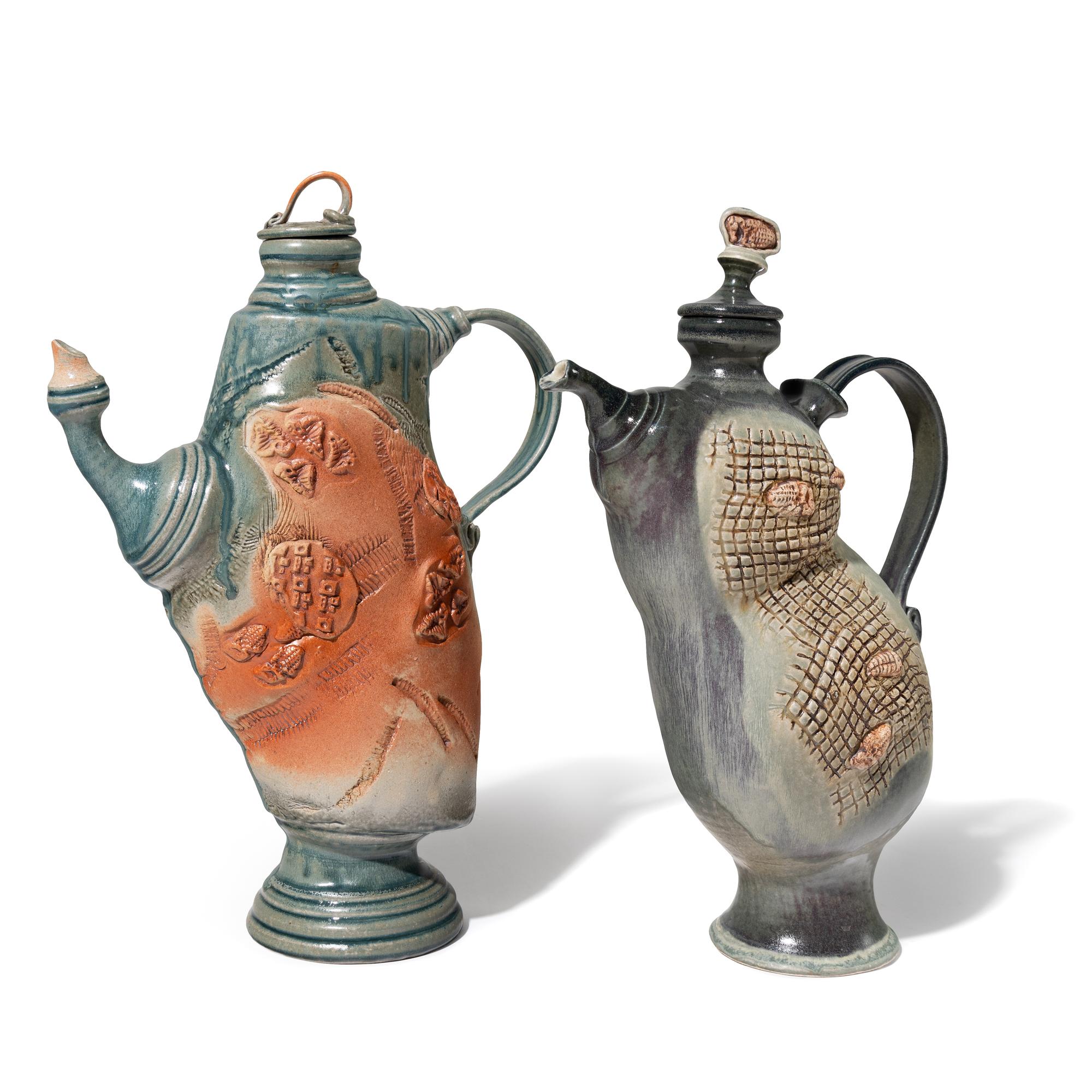Two Thrown-Altered Teapots