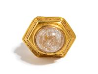 A Hellenistic Gold Finger Ring — with cabochon rock crystal and garnet