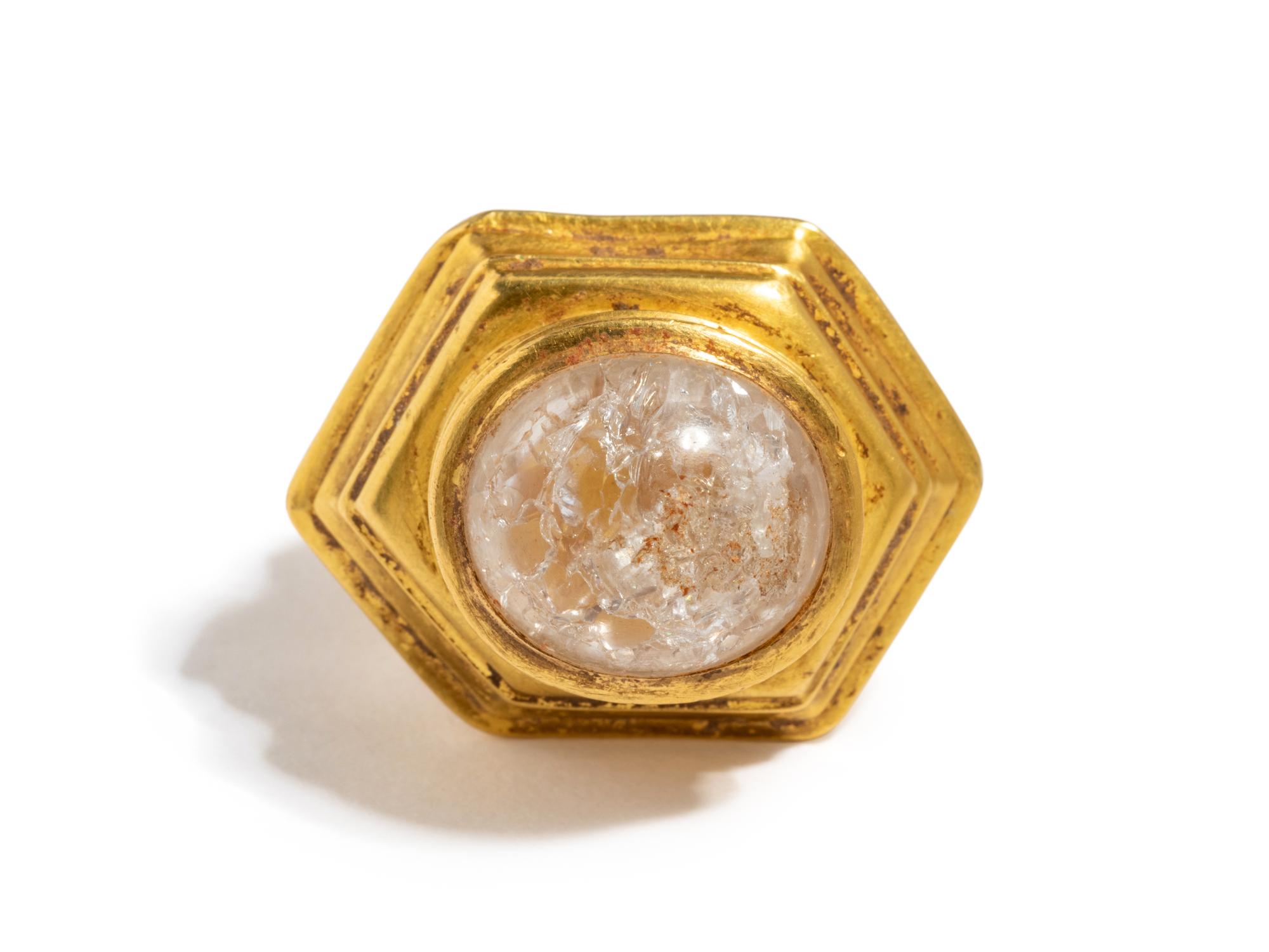 A Hellenistic Gold Finger Ring — with cabochon rock crystal and garnet