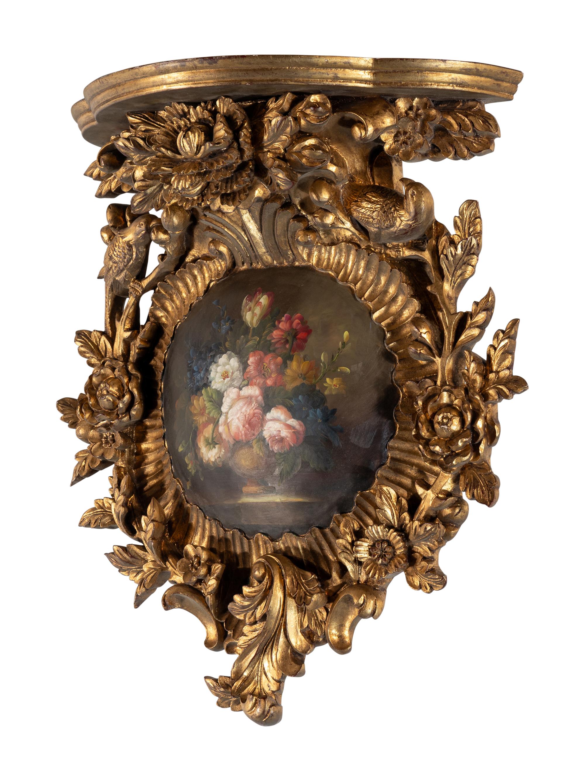 An Italian Painted and Carved Giltwood Wall Bracket