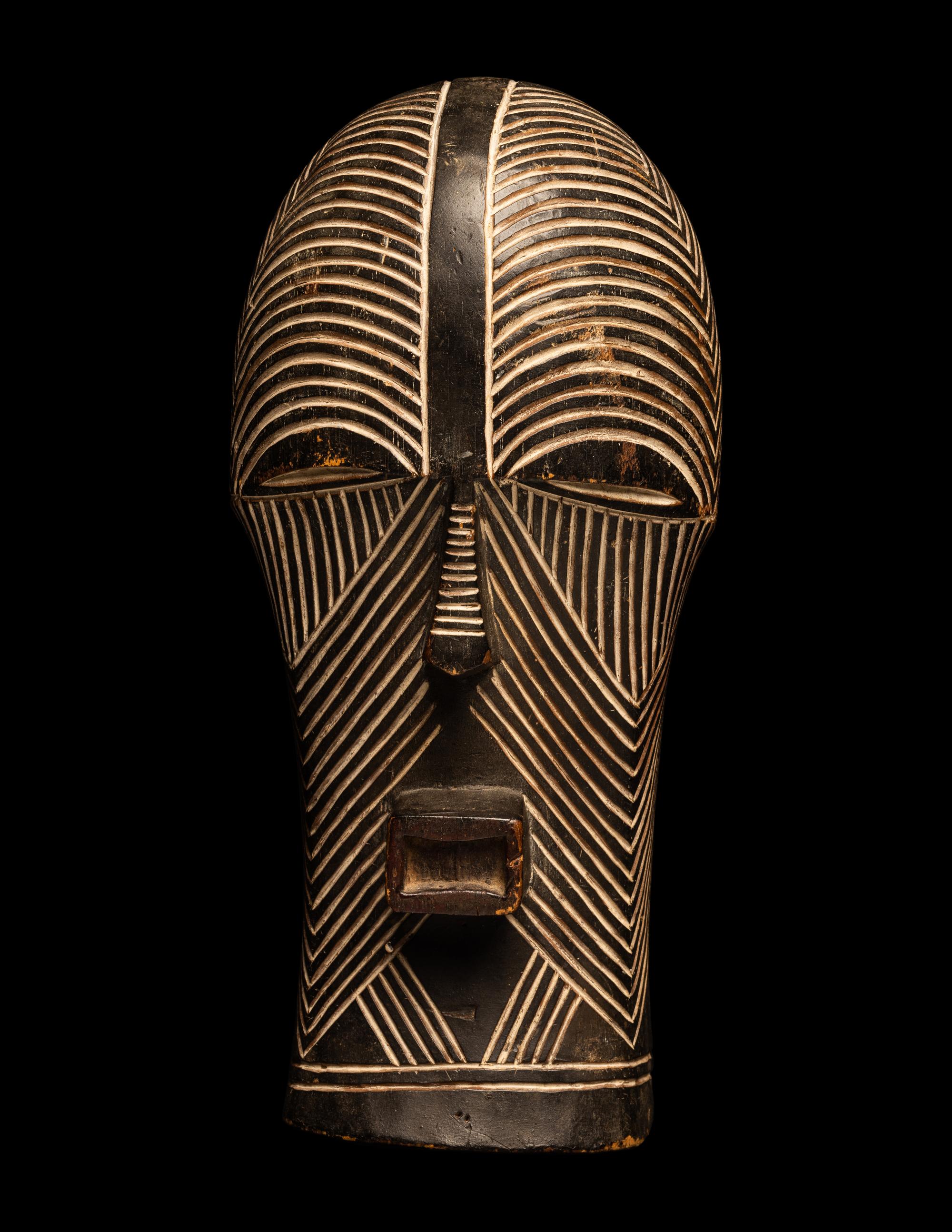 A Songye Wood Female Mask (Kifwebe)
