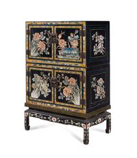 A Chinese Export Lacquered Two-Part Cabinet on Stand