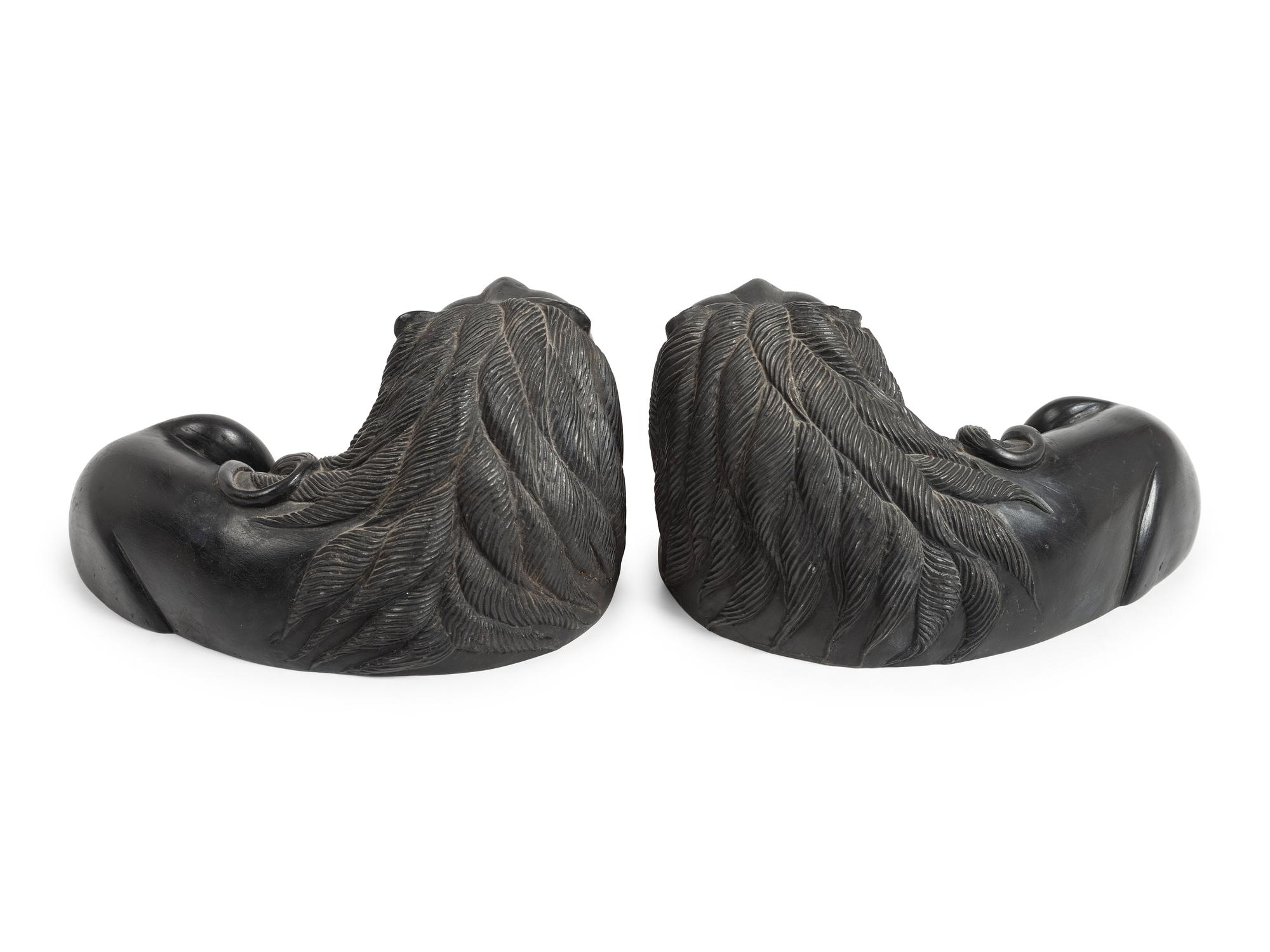 Pair of Northwest Coast-style Molded Lion Bookends