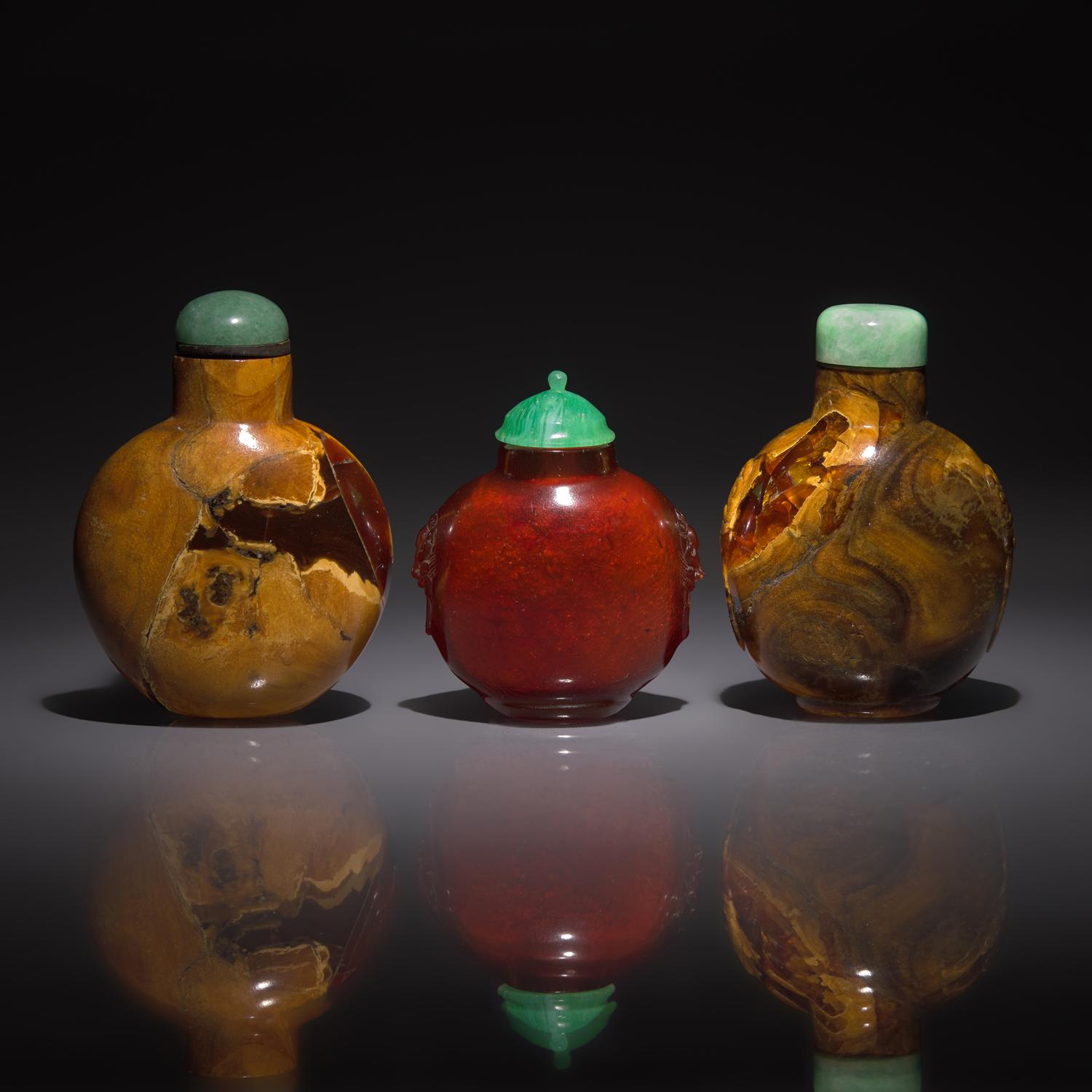 Two Chinese Root Amber and an Amber Snuff Bottle, 18th to 19th Century — 清中期 琥珀鼻烟壺四支