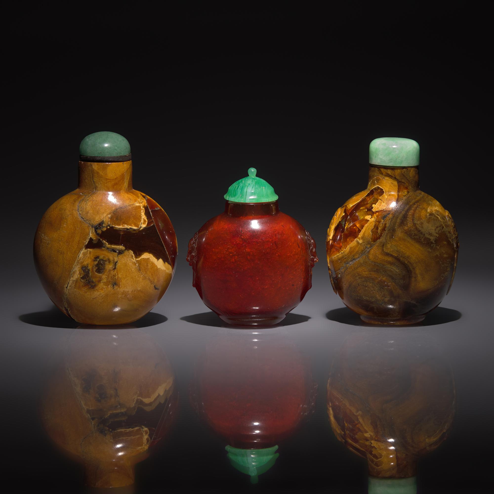 Two Chinese Root Amber and an Amber Snuff Bottle, 18th to 19th Century — 清中期 琥珀鼻烟壺四支