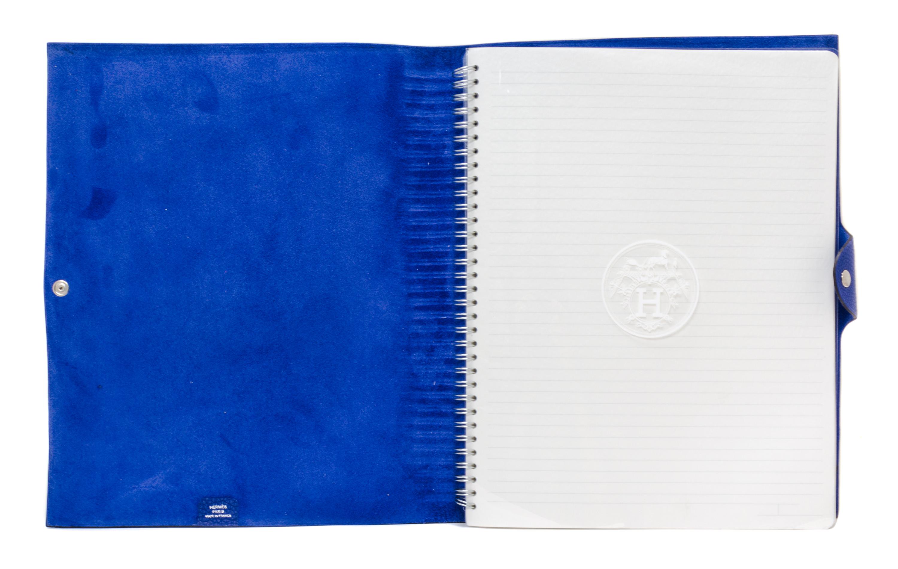 An Hermes Bleu Electrique Togo Ulysse MM Notebook Cover, 9" x 7.5".