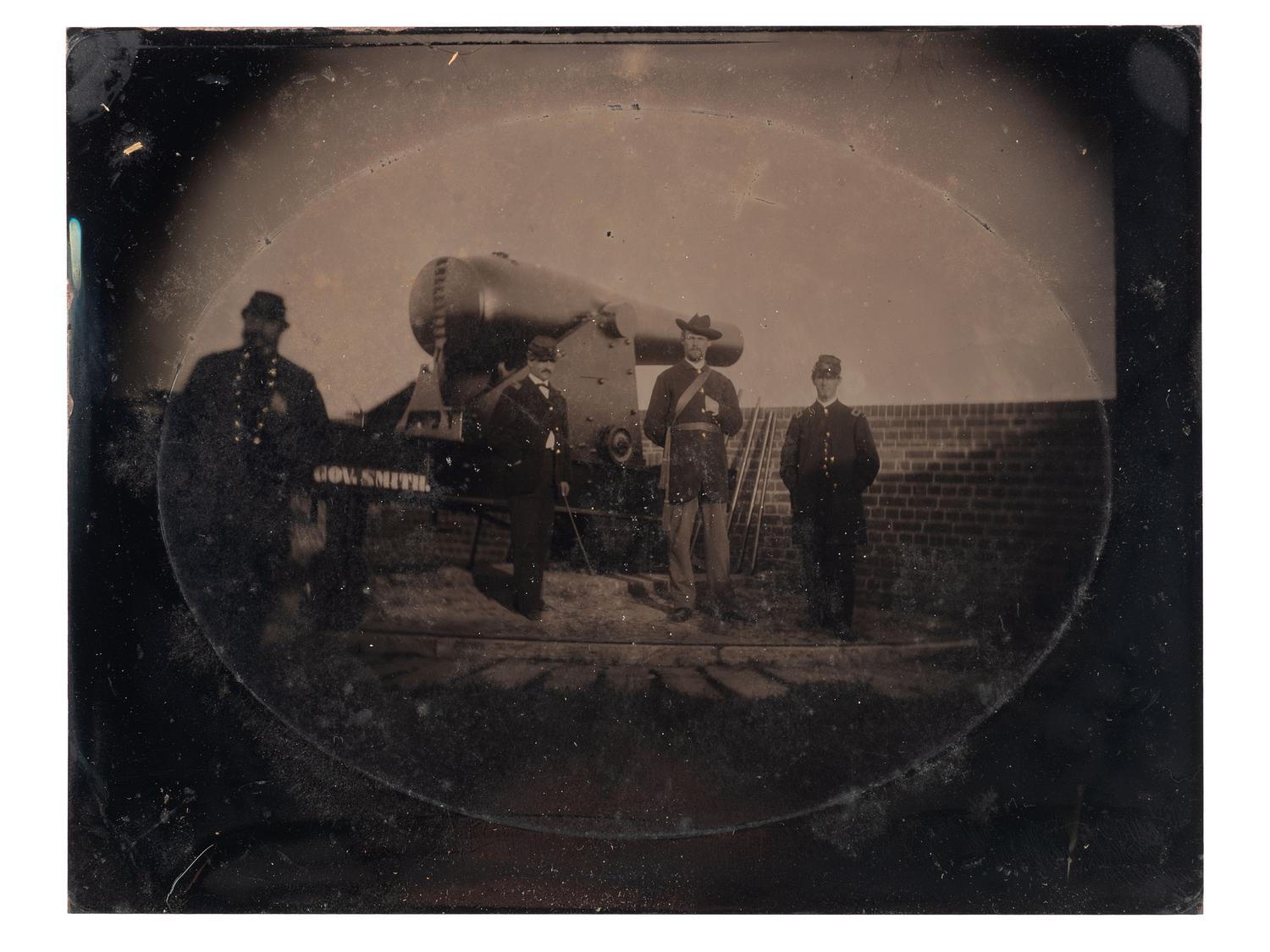 [CIVIL WAR]. Half plate tintype featuring Union officers posed with a Rodman Gun.
