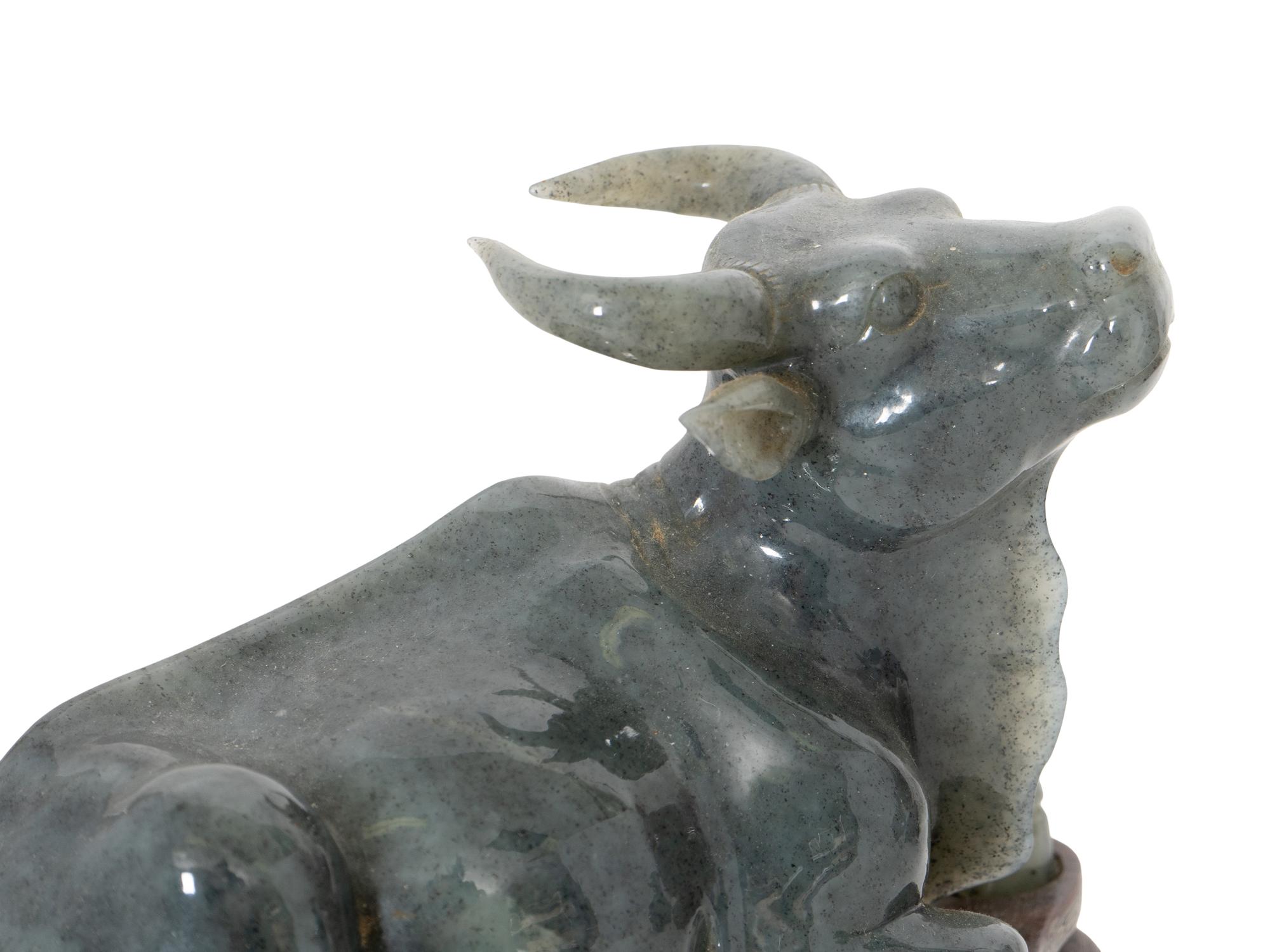 A Trio of Chinese Carved Hardstone Figures on Stands