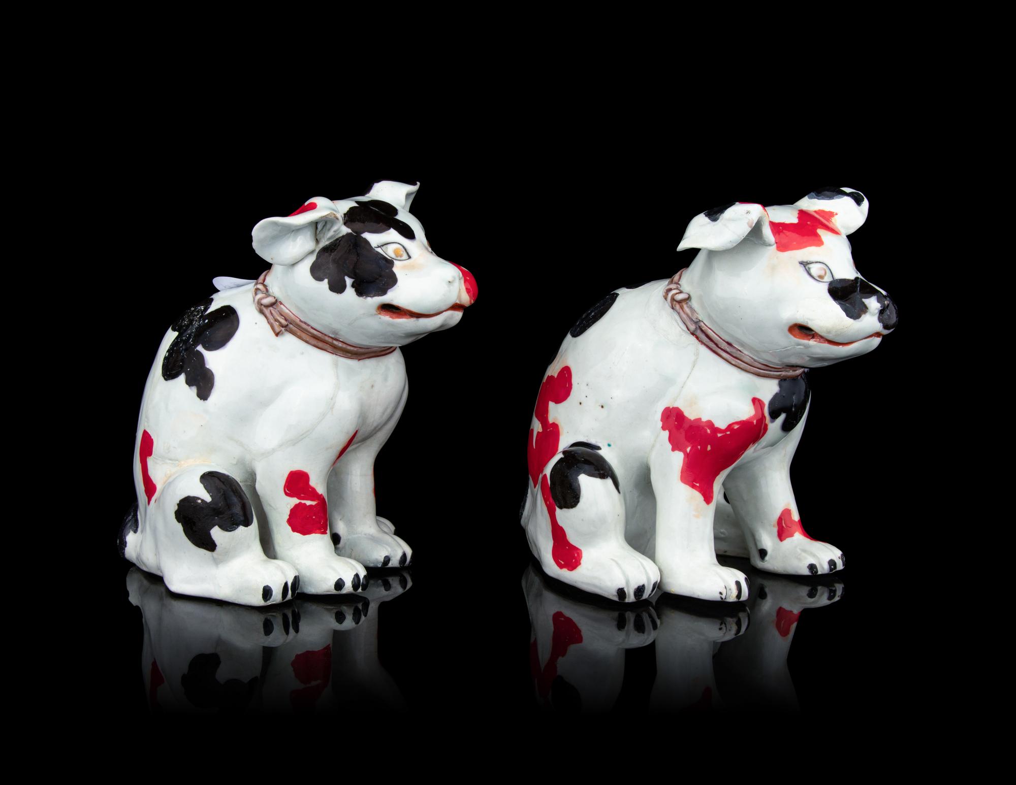 A Pair of Japanese Arita Figures of Puppies