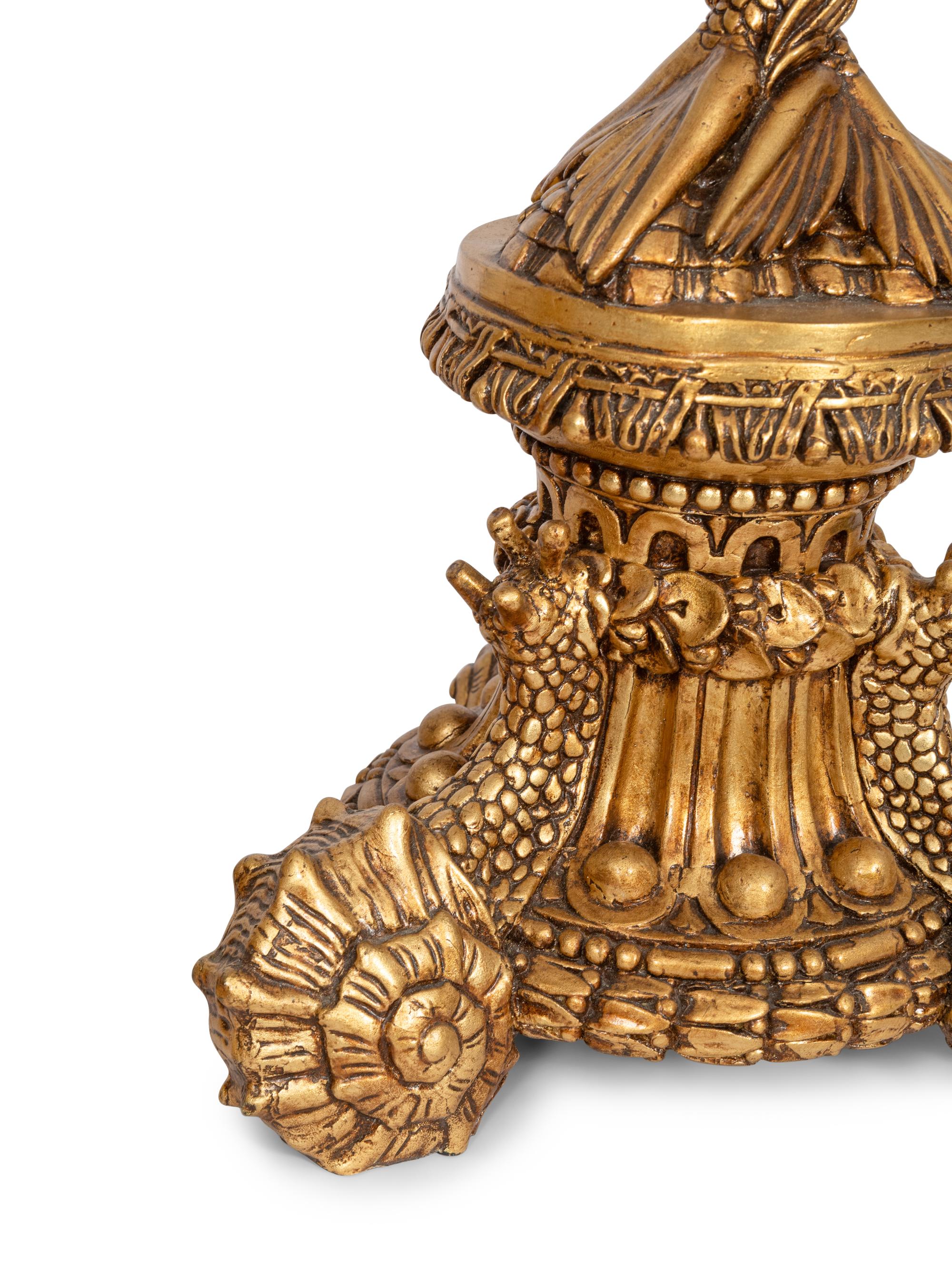 A Pair of Gilt and Black-Painted Torchère Figures of a Mermaid and Merman