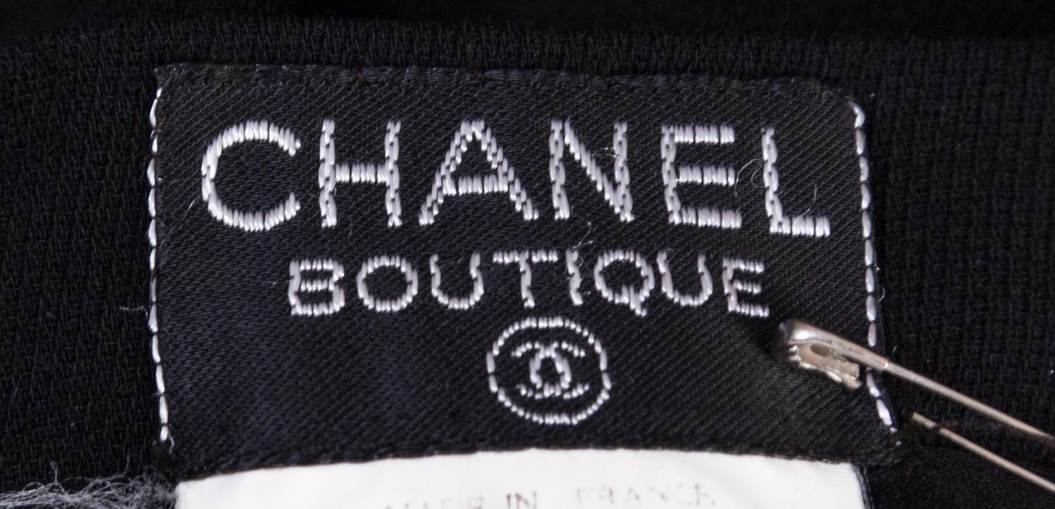 A Chanel Black Wool Skirt Ensemble, Size 40.