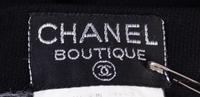 A Chanel Black Wool Skirt Ensemble, Size 40.