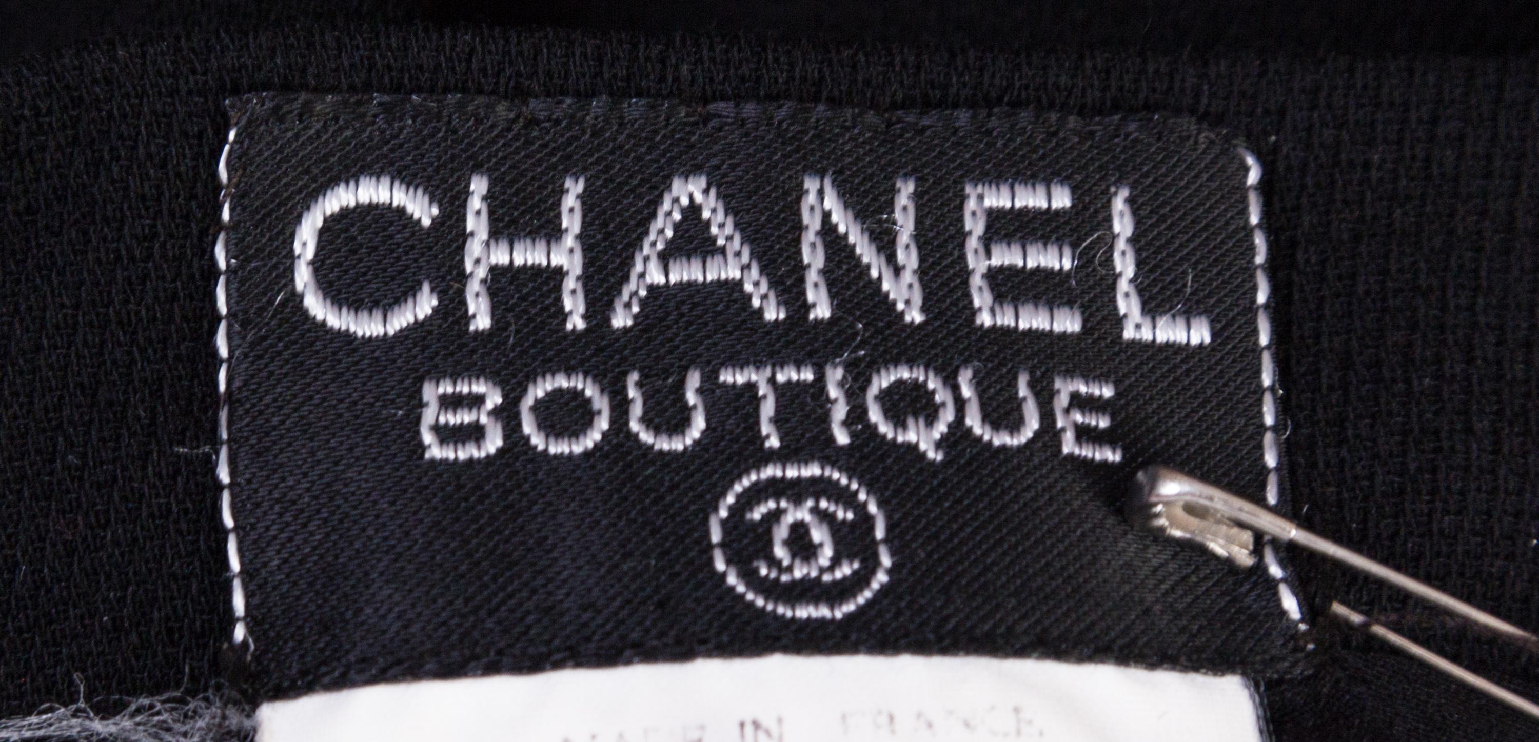 A Chanel Black Wool Skirt Ensemble, Size 40.
