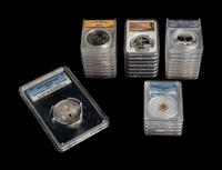 [INTERNATIONAL] A Collection of Thirty-One Government-Issued and Third-Party Graded Commemorative Coins