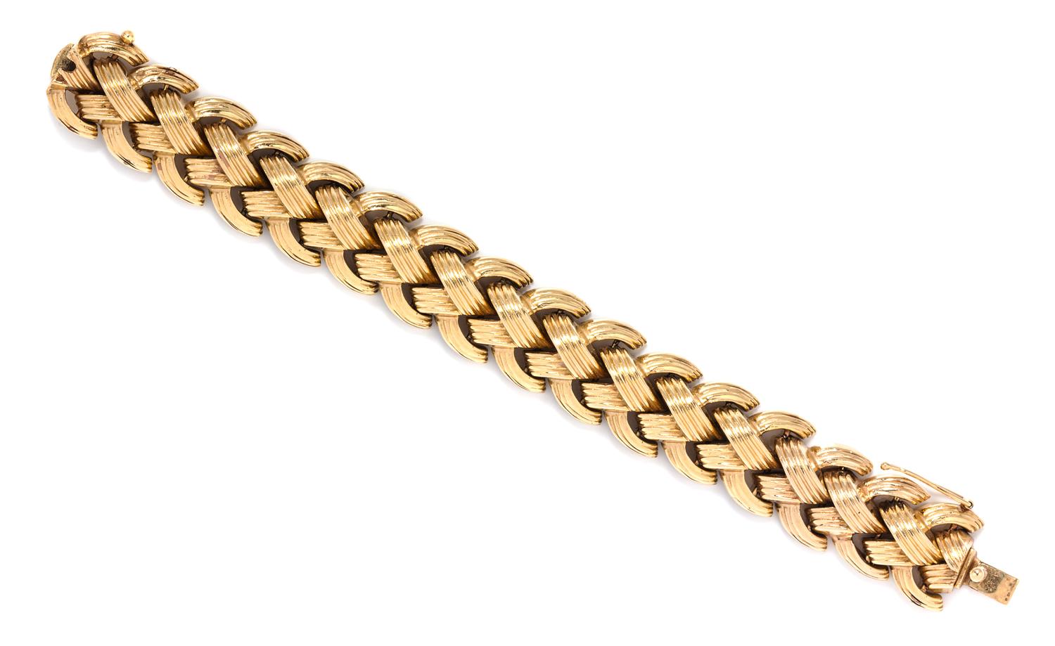 A Yellow Gold Textured Link Bracelet, 46.60 dwts.