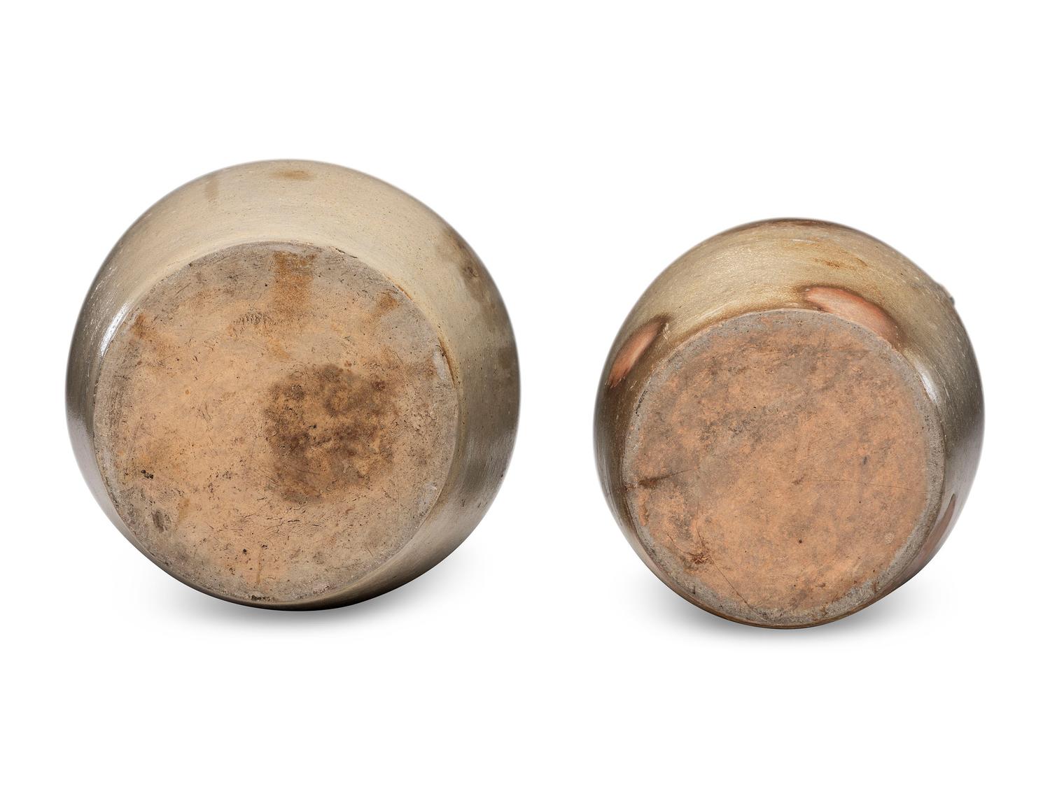 Two Ovoid Stoneware Crocks or Churns