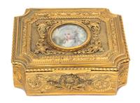 A French Gilt Metal Portrait Jewelry Casket Height 21/4 x width 5 1/8 x depth 4 1/2 inches. — 19TH CENTURY
