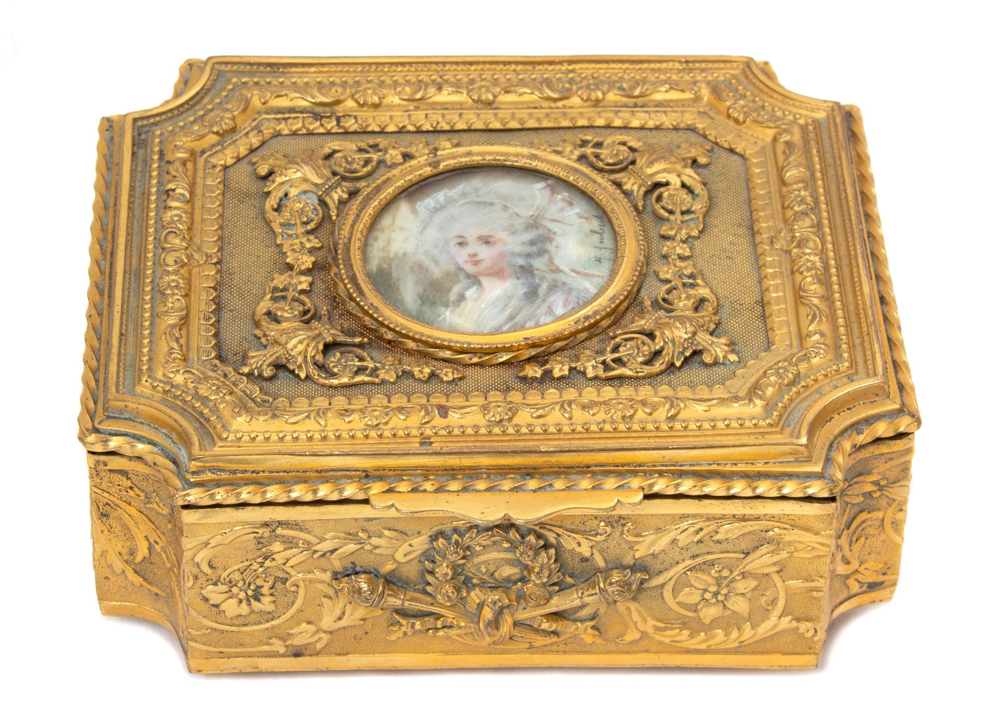 A French Gilt Metal Portrait Jewelry Casket Height 21/4 x width 5 1/8 x depth 4 1/2 inches. — 19TH CENTURY